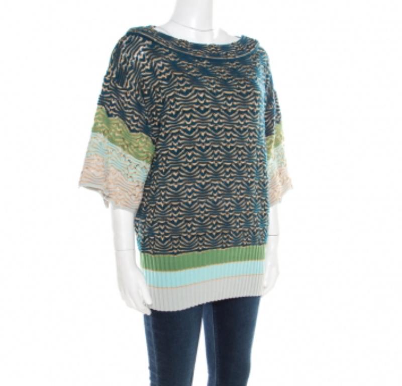 Wenn Sie eine Missoni-Kreation tragen, werden Sie mit Sicherheit Eindruck machen! Der mehrfarbige Pullover ist aus einer Wollmischung gefertigt und zeichnet sich durch einen Rundhalsausschnitt, voluminöse Ärmel und einen perforierten Strick aus.