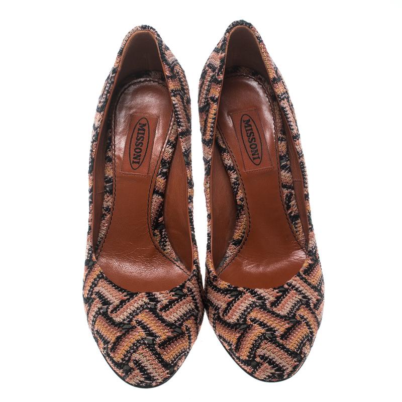 These pumps from Missoni are perfect for an understated yet stylish look. They are crafted from a multicolour patterned knit fabric and feature round toes, comfortable leather lined insoles and 11 cm heels. Pair them with shift dresses or chic