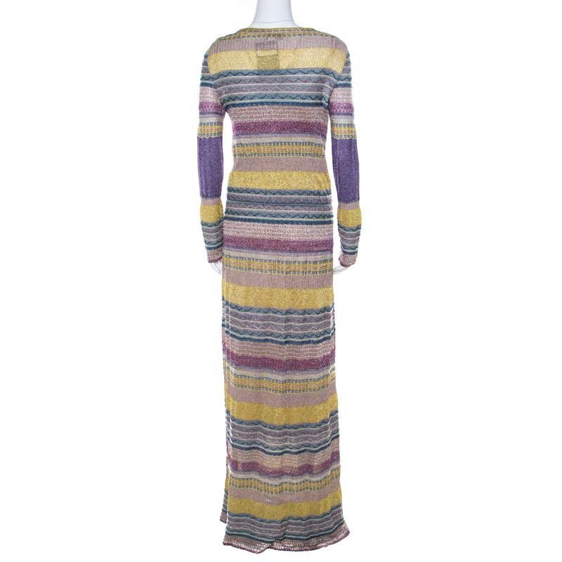 Stunning and graceful, this Missoni dress is a true example of the brand's tasteful designs. Made from superior quality fabrics, this dress is second to none. The trendy multicolors creates a chic finish and the dress is accented with a striped