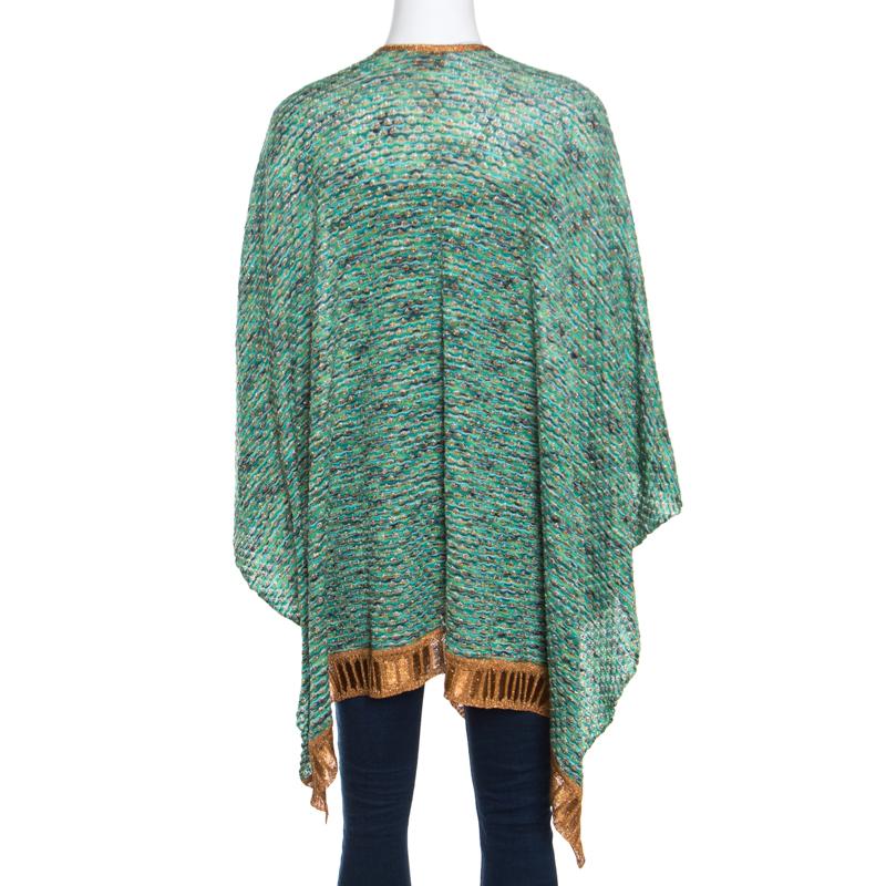 Flattering and feminine, this poncho from Missoni definitely needs to be on your wishlist! It is made of a blend of fabrics and features a multicoloured lurex knit perforated design. It flaunts an open front and an asymmetrical silhouette. Pair it