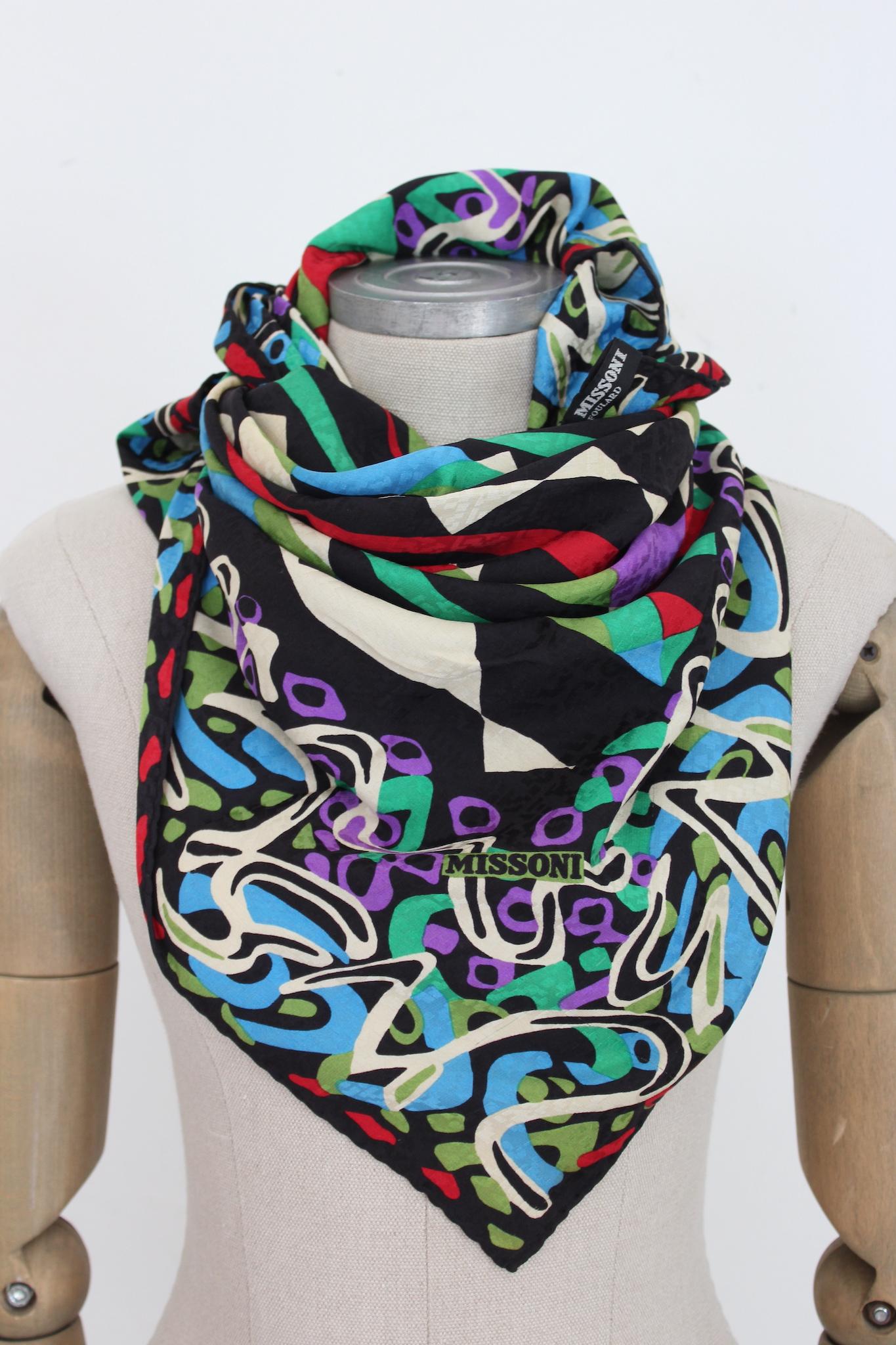 Missoni beautiful vintage 90s multicolor silk scarf. Bright colors from red, blue, green and purple that you can wear with any type of outfit. Made in Italy.

Measures: 83 x 90 cm