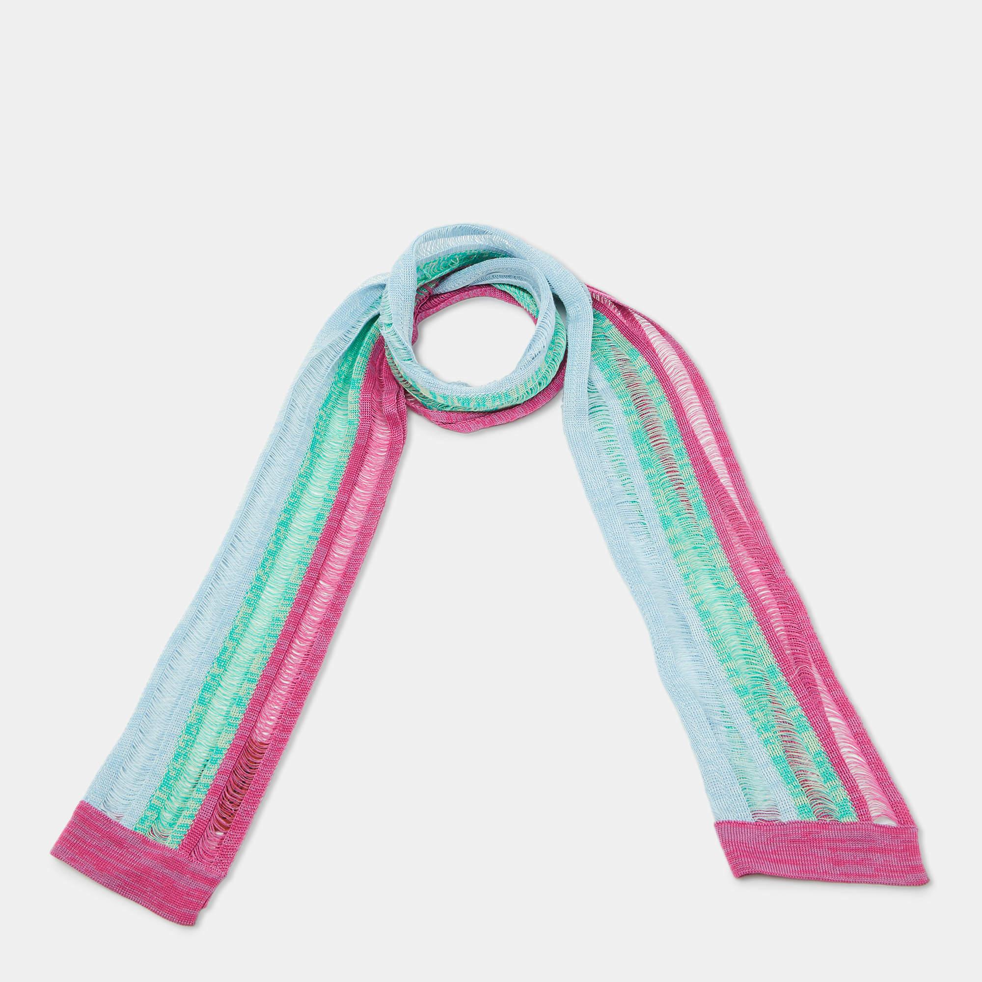 Wrap yourself in luxury with this exquisite Missoni stole. Crafted knit its signature patterns and rich vibrant colors capture the essence of Italian sophistication. The soft fabric offers warmth without weight making it perfect for transitioning