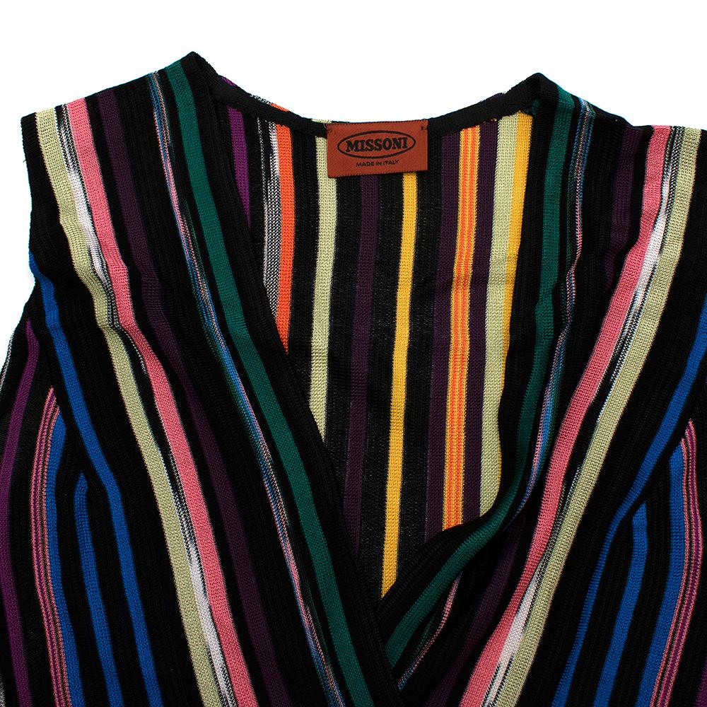 Missoni Multicolor Striped Knit Dress

- Made of soft knit 
- Gorgeous striped pattern 
- V shaped neckline 
- Band to the waist 
- Short length 
- Classic sleeveless cut 
- Cheerful elegant design 

Materials:
97% rayon, 3% polyester

Dry clean