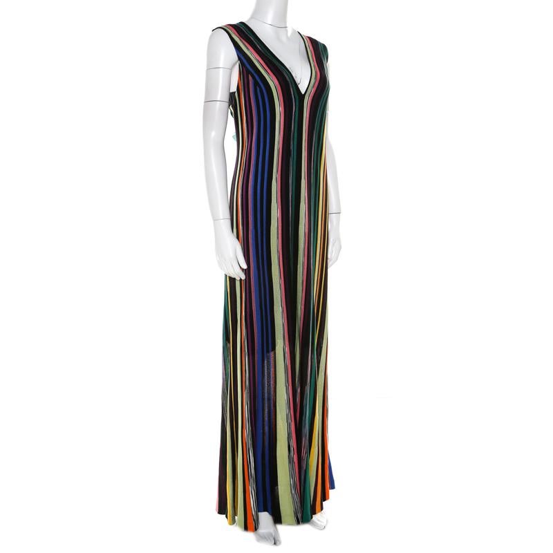 Make a fashion statement when you go out wearing this trendy Missoni dress. This multicolor dress is just a perfect pick for those laid-back days. It has a maxi length and a sleeveless style. Team it with gladiator sandals for a cool