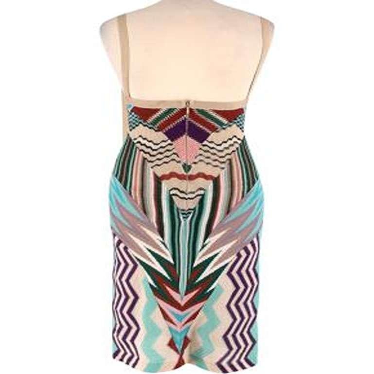 Missoni Multicolour Chevron Knit Dress

- Warm toned zig zag patterned knit midi dress with beige trims and tie detail
- Figure hugging silhouette with nude lining 
- Square neck with beige shoulder straps and a low back 
- Concealed zip down the