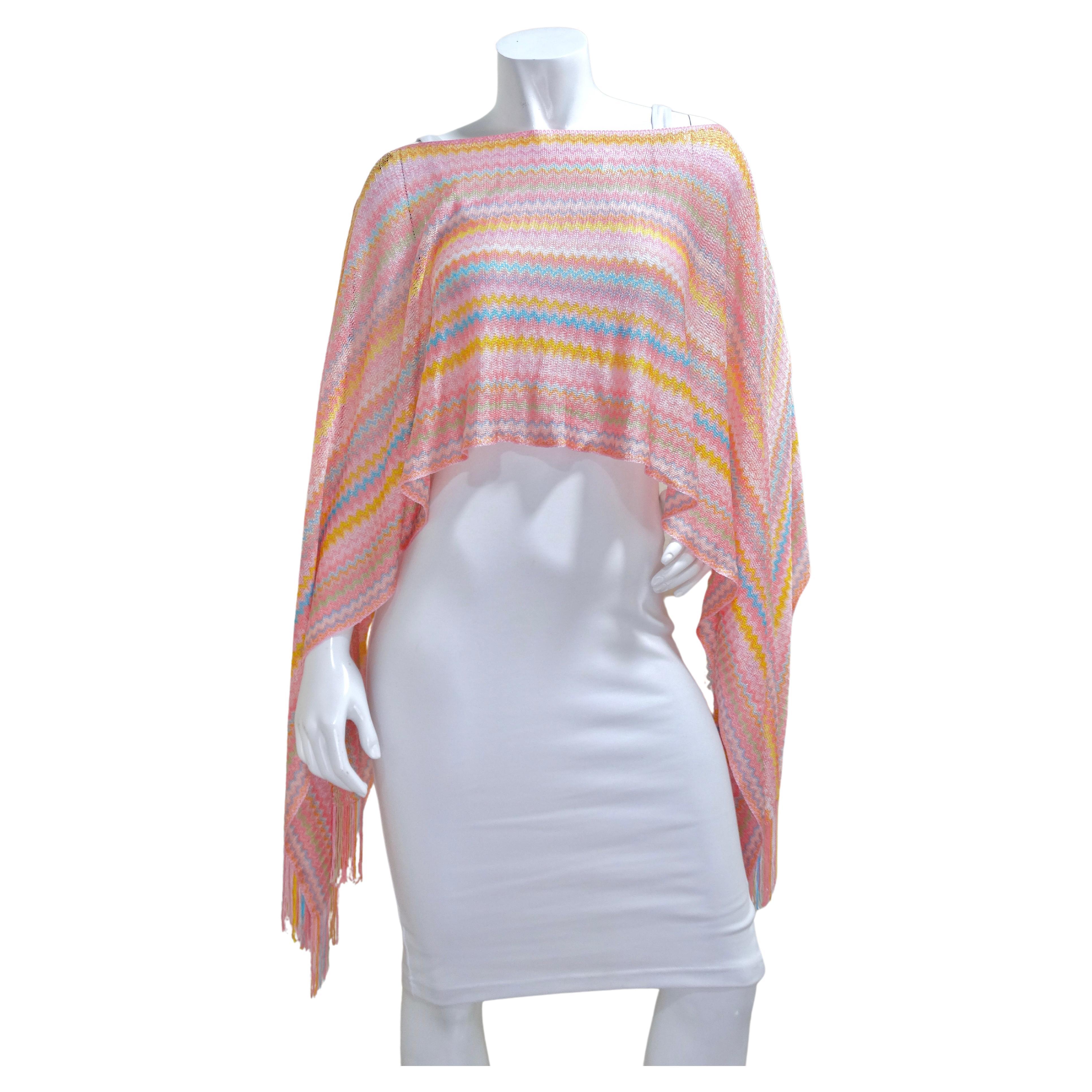 Missoni is known for their iconic and playful knits and this cropped poncho is an emblem of the brand. The cropped length gives a fresh take on a poncho and the fringe details adds a fun and flirty aspect. This top is versatile as it could be worn