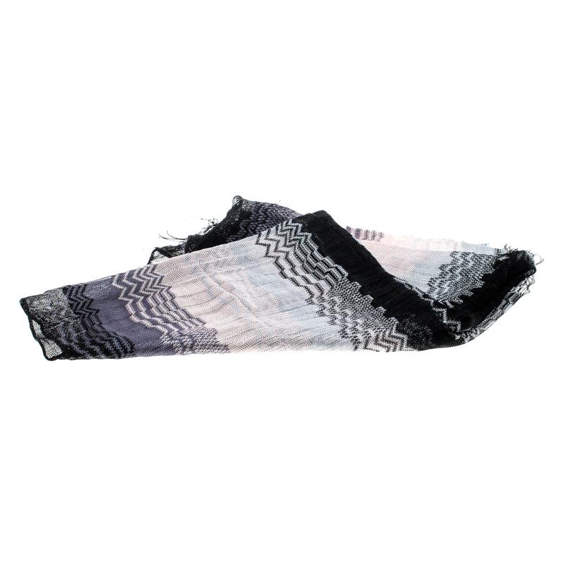 Accessorise with ease using this lovely ombre scarf from Missoni. It has been loosely knit in a chevron design and finished with tassels.

Includes: The Luxury Closet Packaging

The Luxury Closet is an elite luxury reseller specializing in the