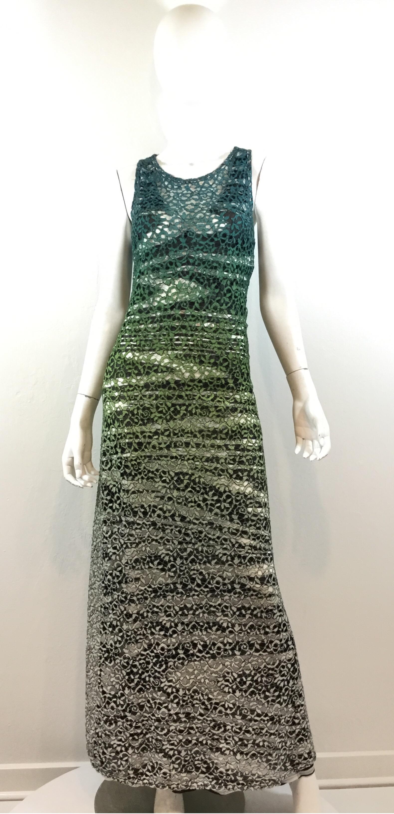 Missoni gown features a multicolor ombre design and a full lace overlaying a black and white print knitted shell. Dress has a slip-on entry and is a size  . Made in Italy. 

Bust 34”
Waist 30”
Hips 35”
Length 56”