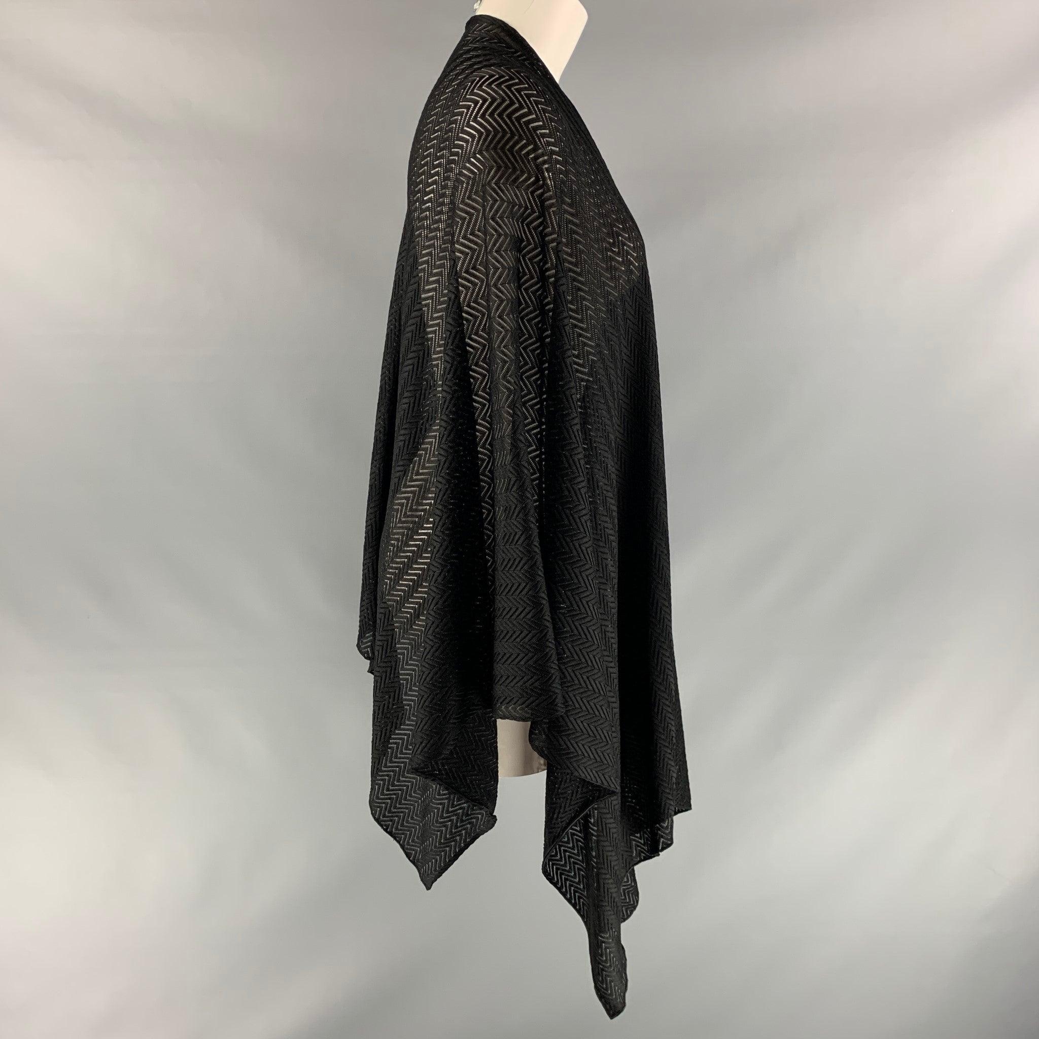MISSONI open front cardigan comes in black herringbone fabric featuring asymmetrical bottom. Made in Italy.Very Good Pre-Owned Condition. Fabric Tag Removed. 

Marked:   no size marked. 

Measurements: 
 
Shoulder: 18 inches Sleeve: 21 inches
