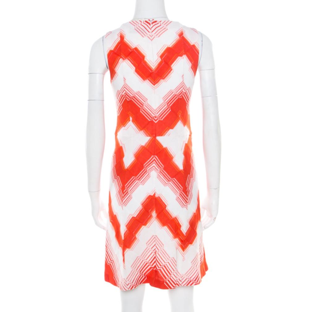 A bright piece like this Missoni dress can be effortlessly paired up with some statement pieces- say a white shoulder bag or a metallic crossbody bag. It features patterns in orange and white and a sharp V neckline.

Includes: The Luxury Closet