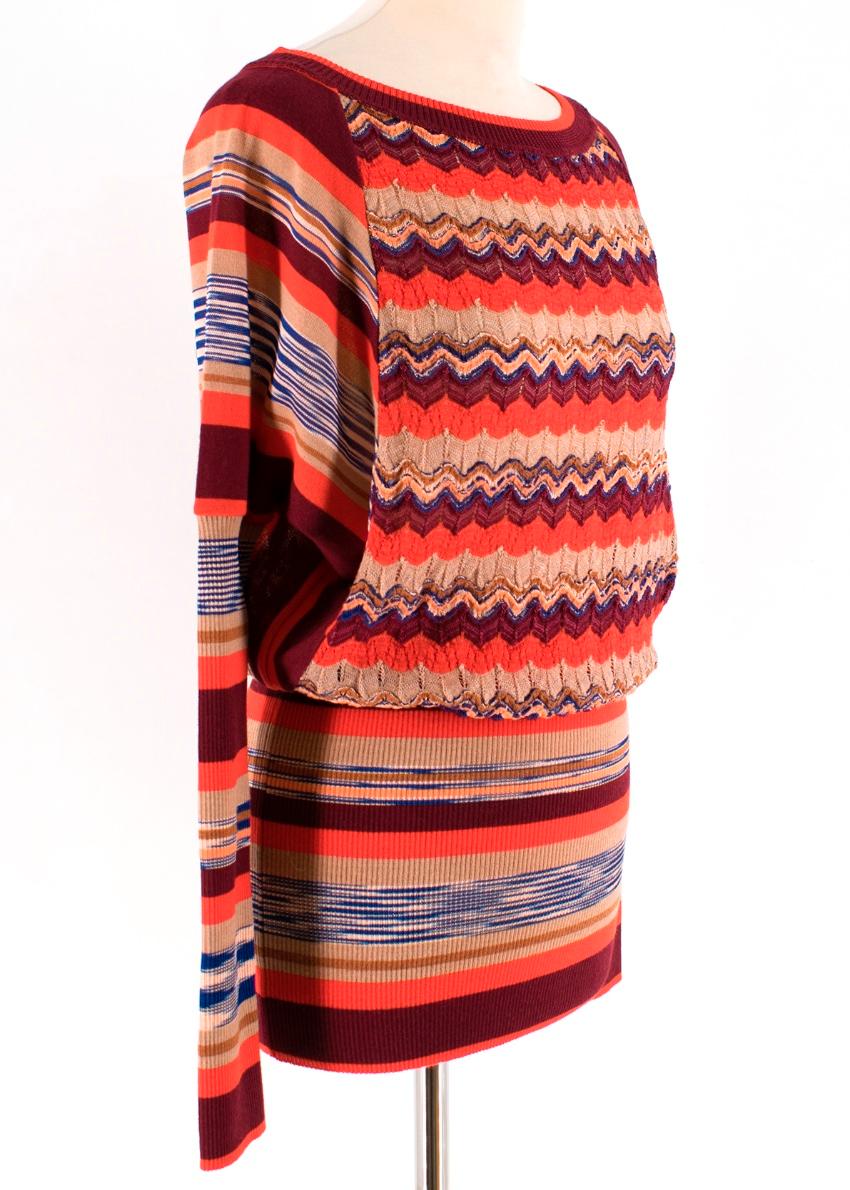 Missoni - Orange Patterned longline Jumper

- long sleeve
- boat neck 
- longline
- ribbed neck, arms and waist with striped pattern
- contrasting zig zag pattern at the chest
- batwing sleeves

55% wool, 40% rayon, 5% nylon
- dry clean only
- made