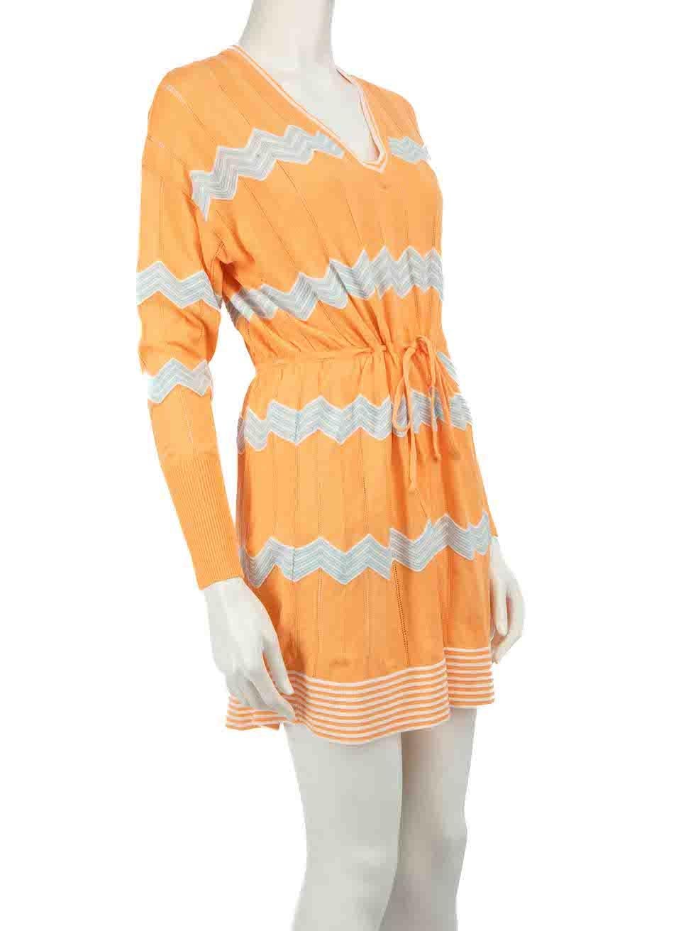 CONDITION is Good. Minor wear to dress is evident. Light wear to right shoulder where a hole is seen on this used M Missoni designer resale item.
 
 
 
 Details
 
 
 Orange
 
 Cotton
 
 Knit dress
 
 Zigzag pattern
 
 V-neck
 
 Long sleeves
 
 Mini
