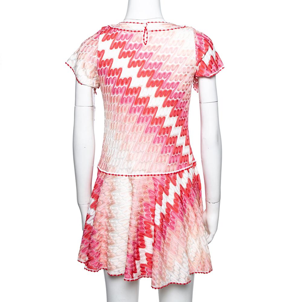 From the house of Missoni, this dress is a classy piece to own. This skater dress is the right fusion of sophistication and comfort as it smoothly takes you through the day. It is complete with a beautiful pattern in a pink hue all over.

