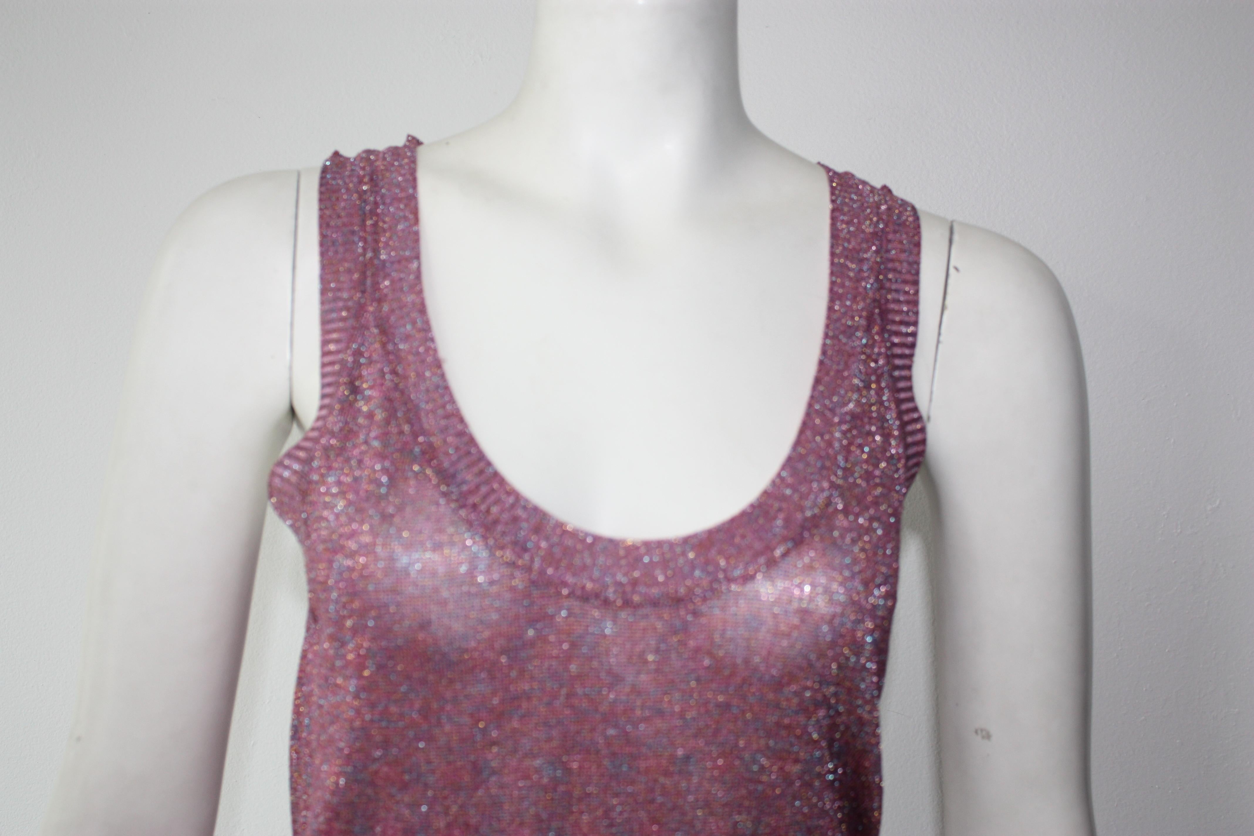 Missoni sleeveless pink sparkle knit top. Brand label tag has detached on one side, otherwise, in perfect condition.

Rayon, cupro, polyester blend.
Size 40 (fits smaller ) 