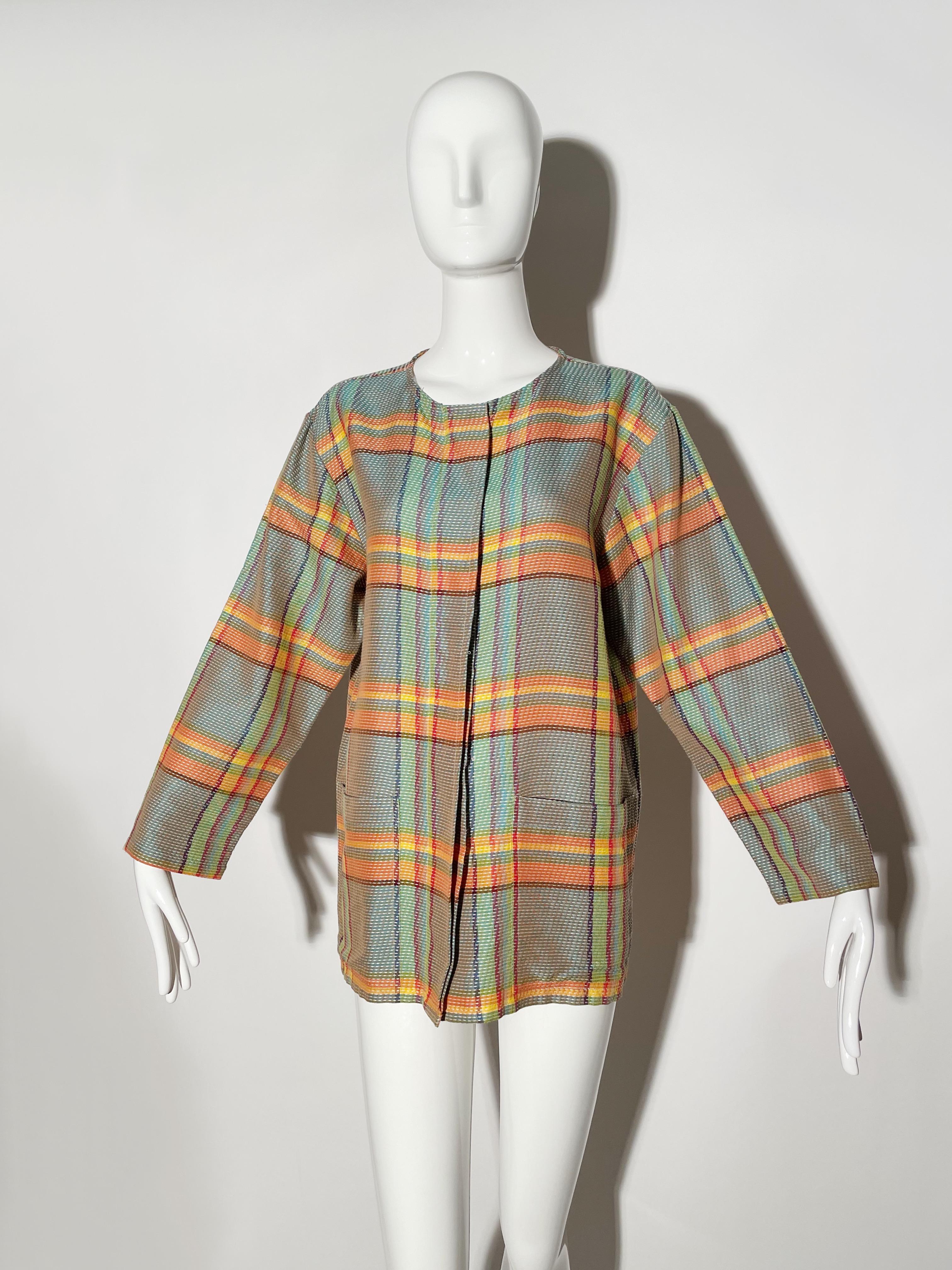 Neon plaid blouse. Hidden front button closures. Front pockets. Cotton. Made in Italy
*Condition:  excellent vintage condition. No visible flaws.

Measurements Taken Laying Flat (inches)—

Shoulder to Shoulder: 18 in.

Bust: 20 in.

Sleeve Length: