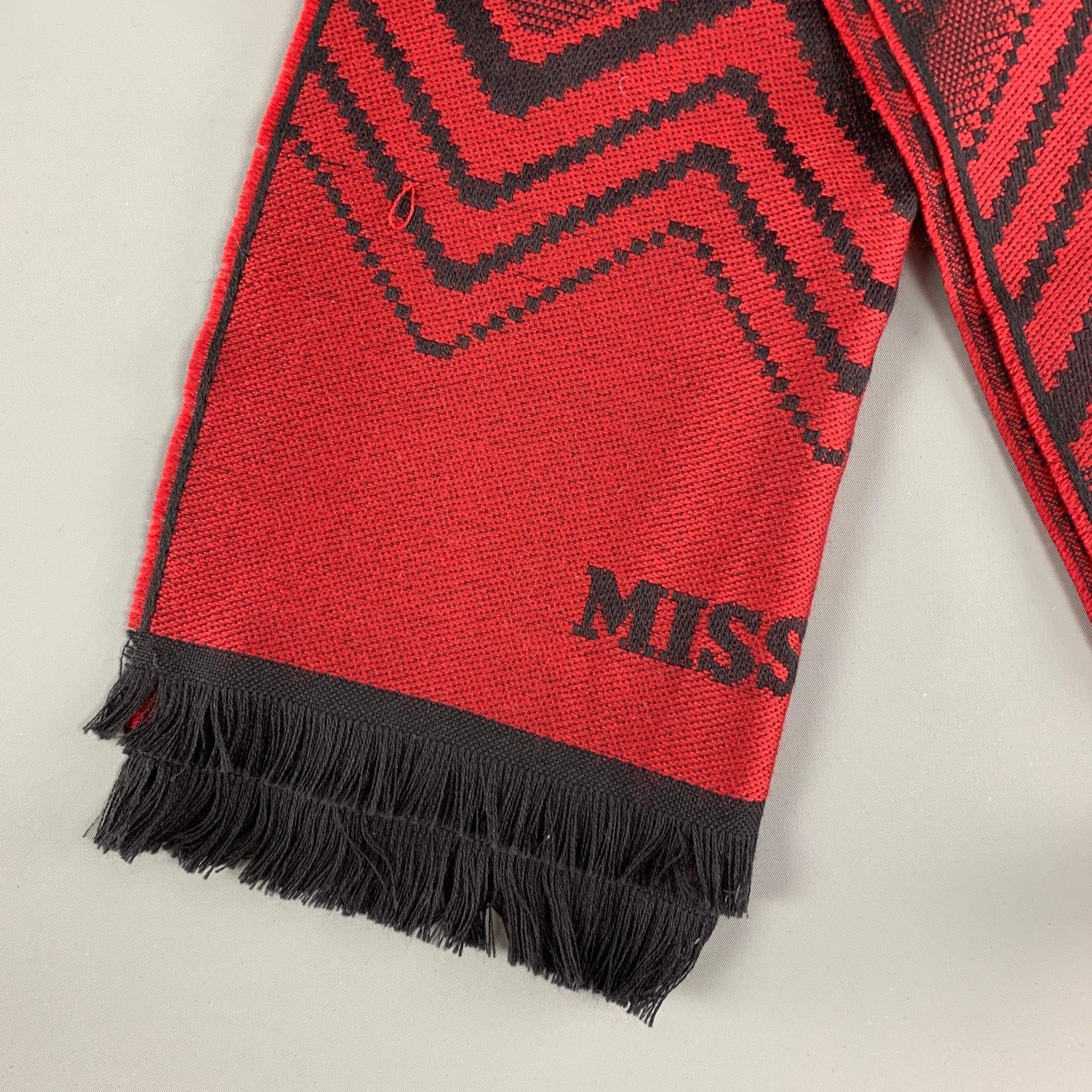 MISSONI scarf comes in a red & black knitted print merino wool with a fringe trim. Made in Italy.
 Excellent
 Pre-Owned Condition. 
 

 Measurements: 
  78 inches x 15 inches 
  
  
  
 Sui Generis Reference: 122648
 Category: Scarves
 More Details

