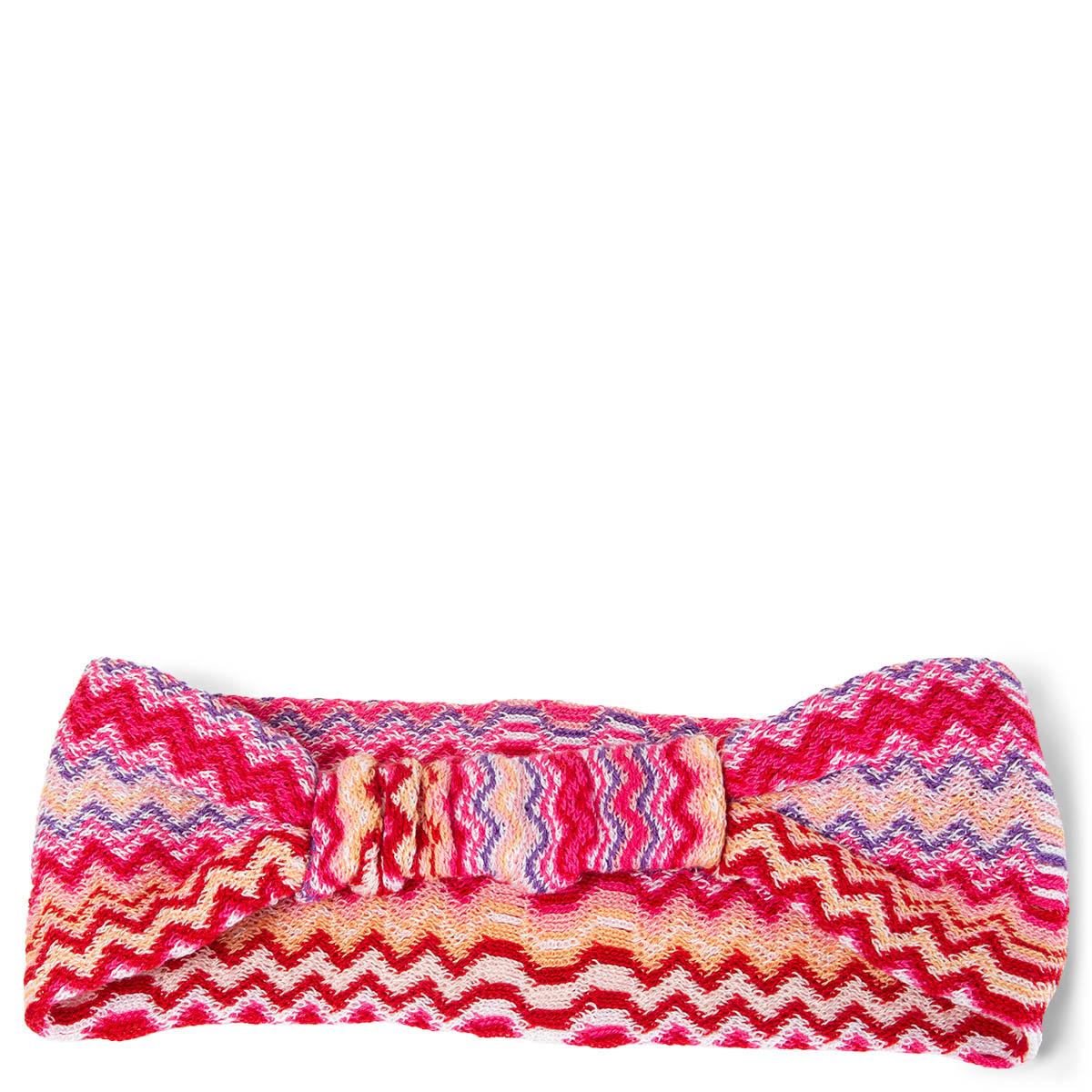 100% authentic Missoni zig zag headband in pink, salmon, red, lilac and white wool (50%) and acrylic (50%). Elastic band on the back. Has never been worn and is in virtually new condition. 

All our listings include only the listed item unless