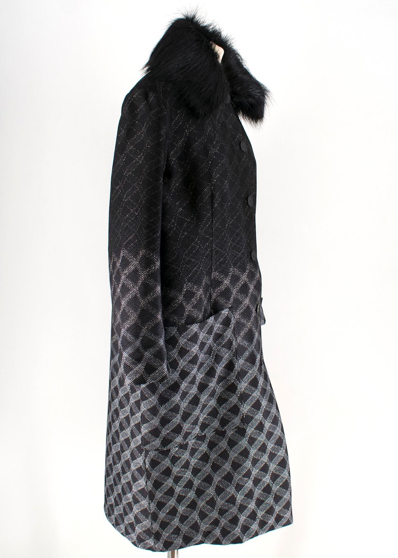Missoni Reversible Black & Silver Knit Padded Coat 

- reversible black coat
- termo padding
- slip pockets
- button fastening to the font
- removable faux fur collar

Please note, these items are pre-owned and may show some signs of storage, even