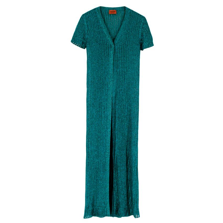 Missoni Short Sleeved Metallic Longline Open Cardigan/Cover-Up

-Teal metallic blended fabric
-Short sleeved ribbed texture, longline
-Perfect transitional piece for Spring - Summer

Materials: 
No care label but we believe it to be a polyester