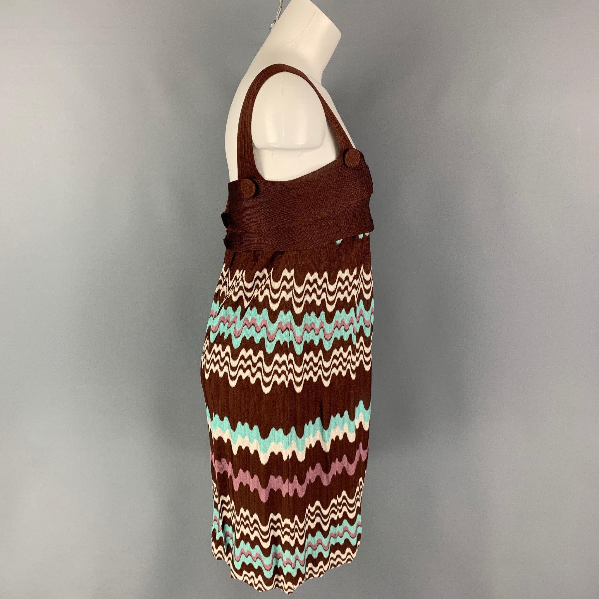 MISSONI dress comes in a brown & blue knitted abstract print stretch rayon featuring a layered panel, button details, and thick straps.
Very Good
Pre-Owned Condition. 

Marked:   38 

Measurements: 
  Bust: 28 inches Hip: 34 inches Length: 29 inches