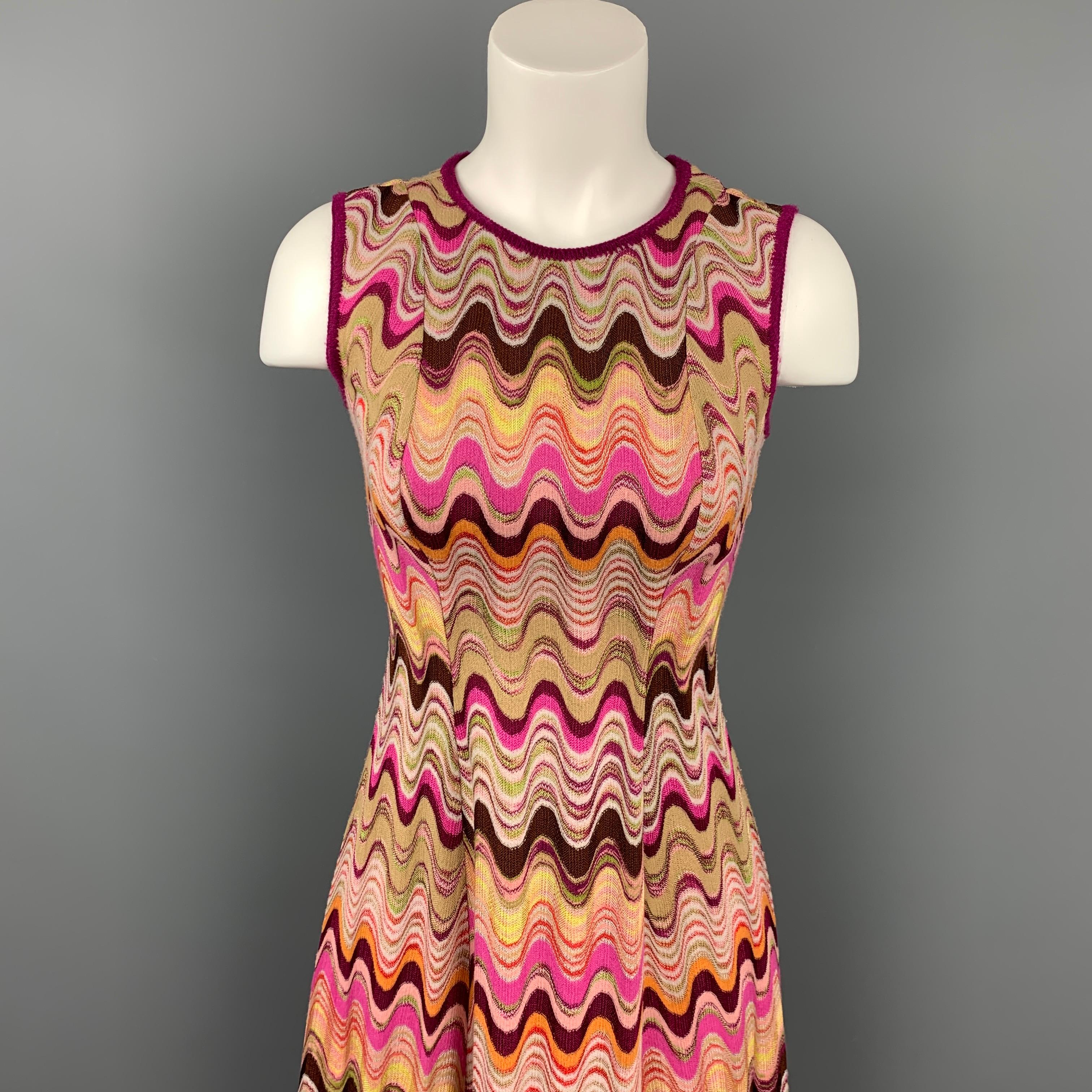 MISSONI dress comes in a multi-color zig zag rayon / wool featuring an a-line style, sleeveless, and a back button closure. Made in Italy.

Very Good Pre-Owned Condition.
Marked: 38

Measurements:

Bust: 30 in.
Waist: 26 in.
Hip: 36 in.
Length: 37