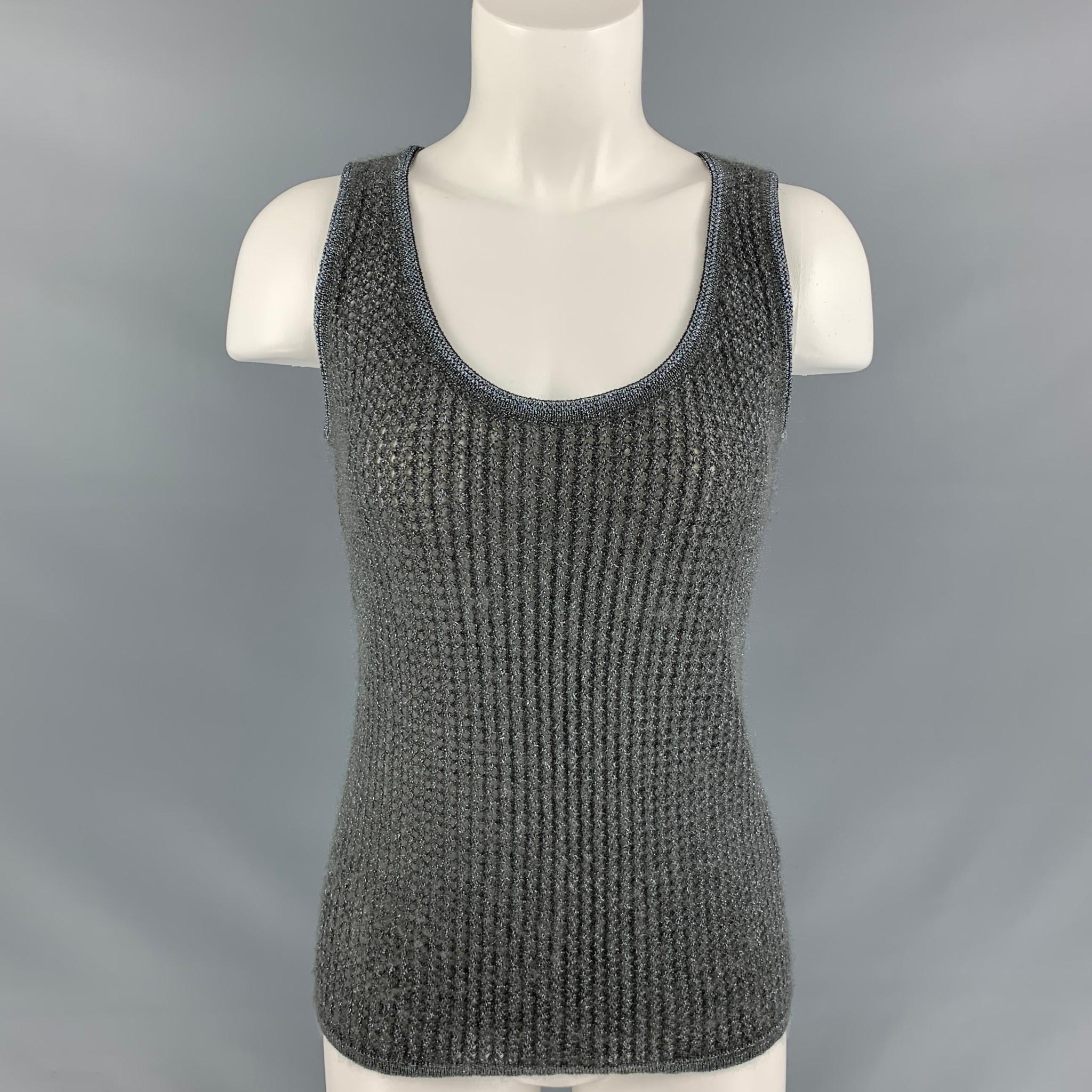 MISSONI casual tank top comes in grey and silver mohair blend knitted featuring U-neck. Made in Italy.

Very Good Pre-Owned Condition.
Marked: 38

Measurements:

Shoulder: 12 in
Bust: 36 in
Length: 23 in

 

SKU: 112356
Category: Casual Top

More
