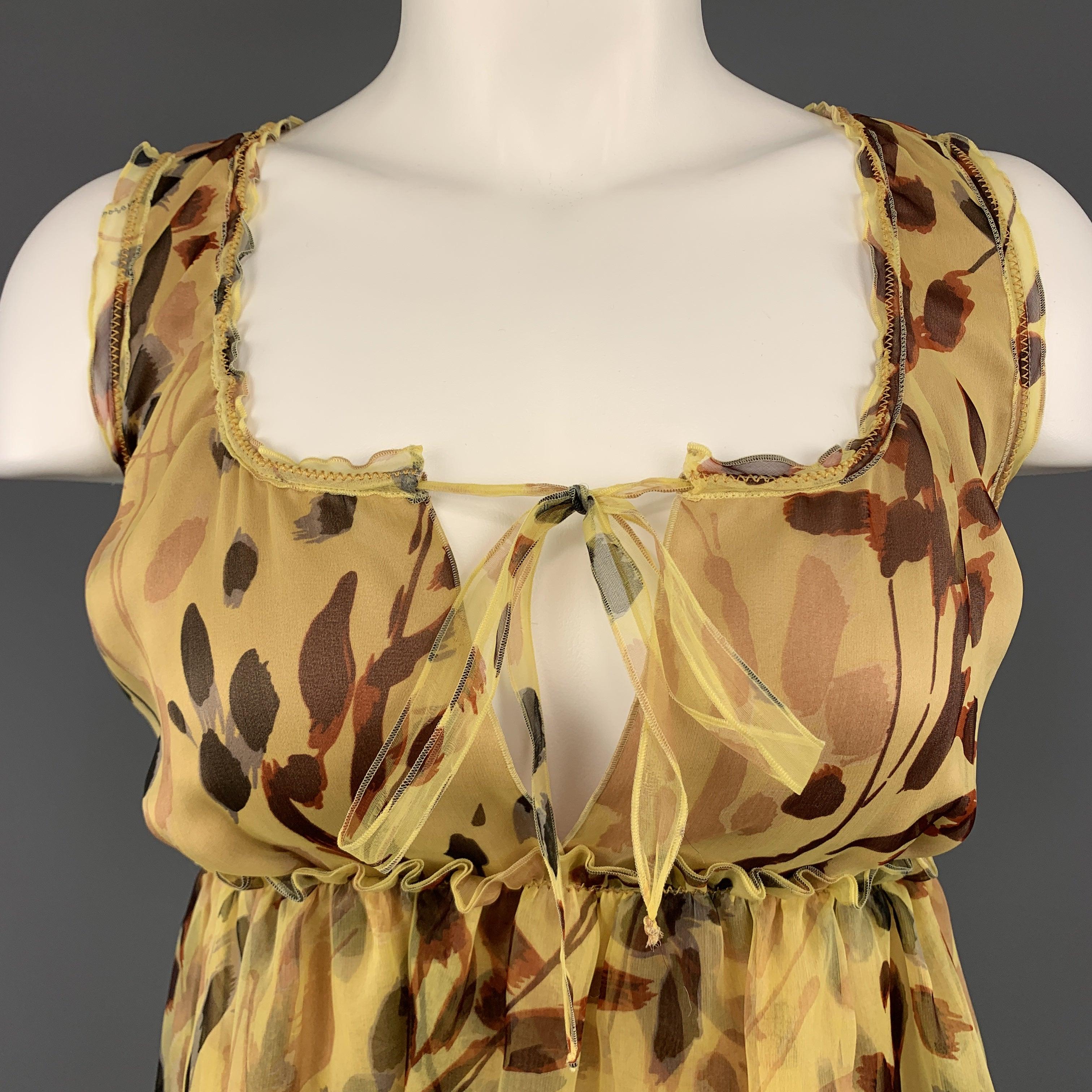 MISSONI camisole top comes in yellow leaves print silk with a tied scoop neck ands ruffled A line hem. Made in Italy.Excellent
Pre-Owned Condition. 

Marked:   IT 38 

Measurements: 
 
Shoulder:
12 inches Bust:
32 inches Length: 20.5 inches 
  
  
