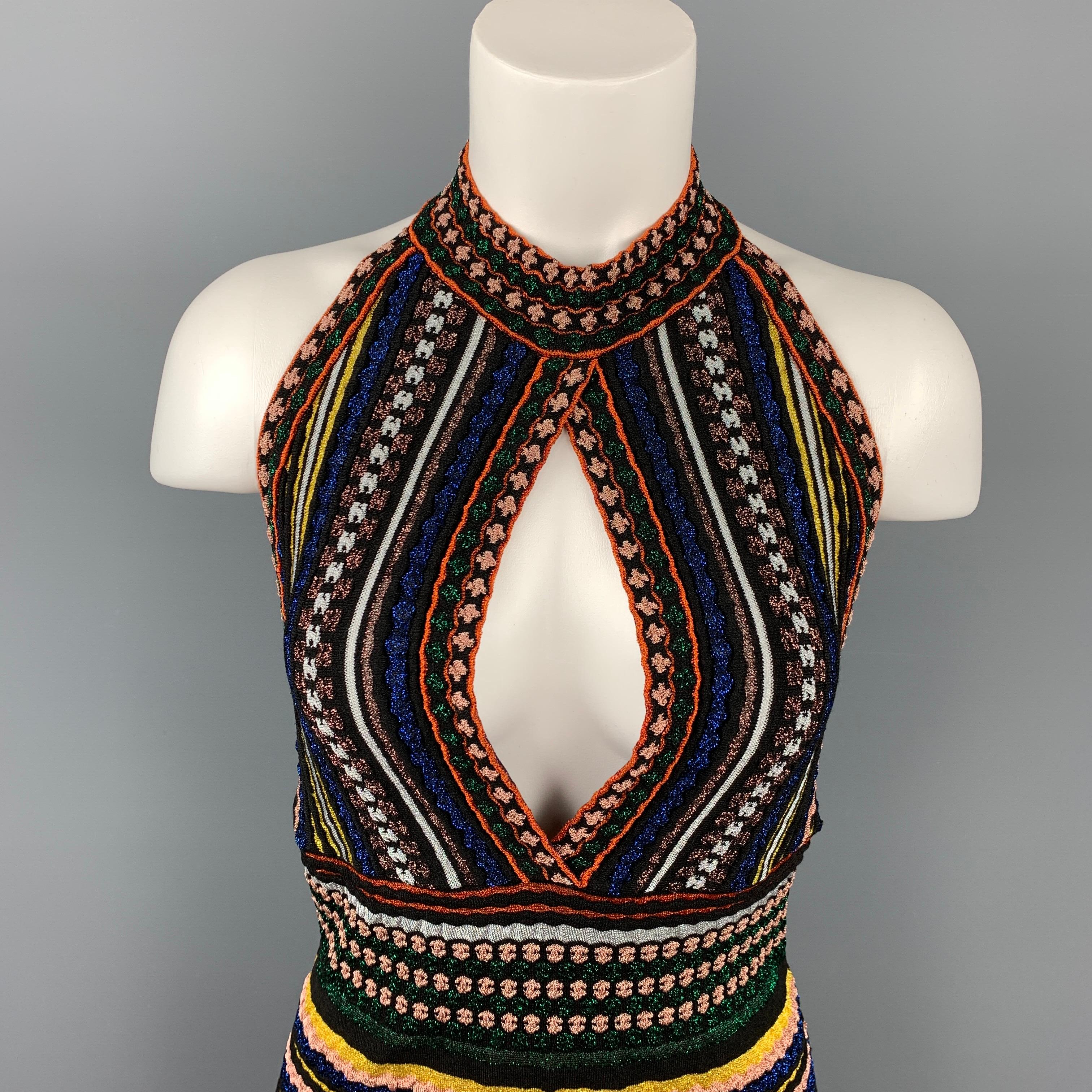 MISSONI dress top comes in a multi-color stripe lurex featuring a halter style, cut out, and a back snap button closure. Made in Italy.

Very Good Pre-Owned Condition.
Marked: No size marked

Measurements:

Bust: 28 in.
Length: 30 in. 