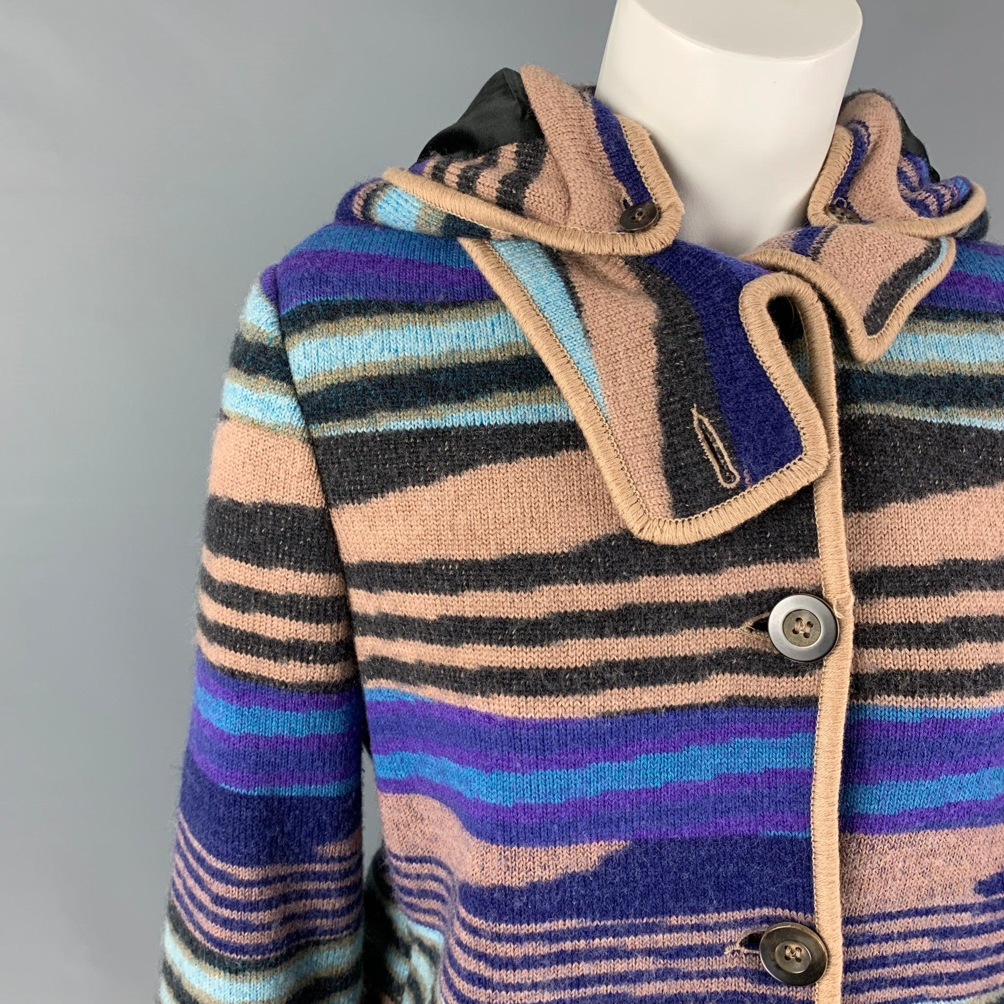 MISSONI coat comes in a multi-color knitted wool featuring a detachable hood, slit pockets, and a buttoned closure. Made in Italy.
Excellent
Pre-Owned Condition. 

Marked:  40 

Measurements: 
 
Shoulder: 15 inches Bust: 35 inches Sleeve: 25 inches