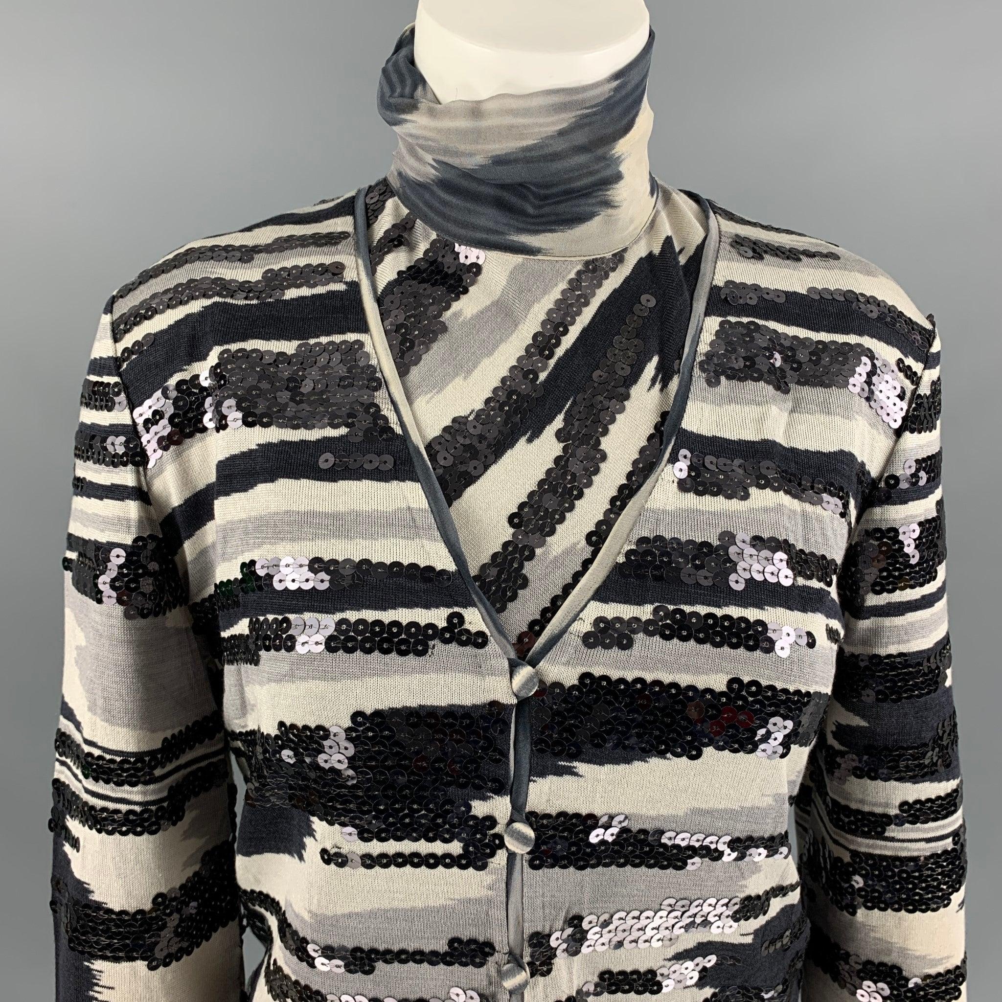 MISSONI dress top set comes in a black and grey silk featuring a sequins embroidery, turtleneck, button down. Made in Italy. Excellent Pre-Owned Condition.  

Marked:   42 

Measurements: 
 
Shoulder: 16 inBust: 38 inSleeve: 21 inLength: 22 in
  
 
