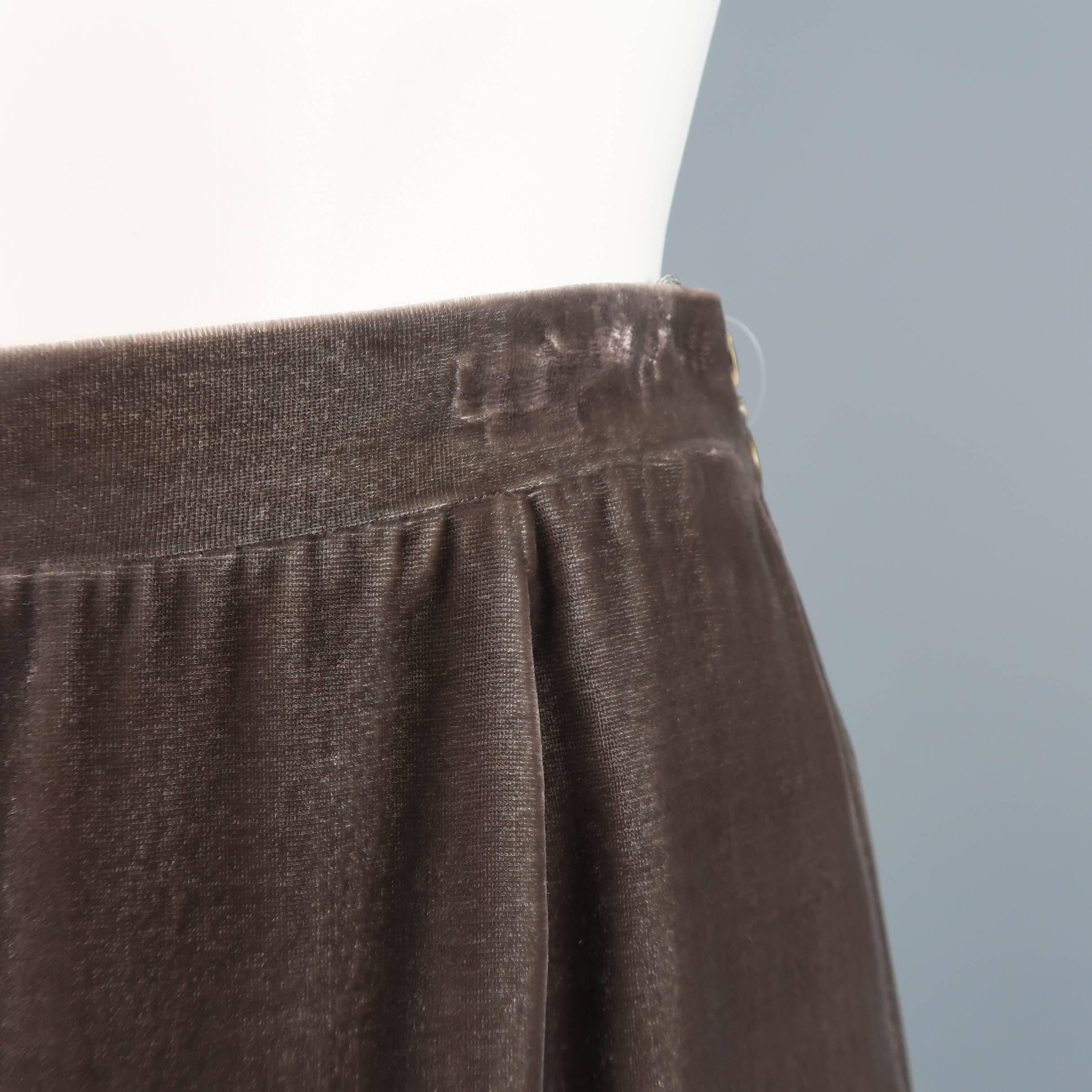 MISSONI pencil skirt comes in taupe gray silk blend velvet with a gathered front, and double dark gold tone zip sides. With Tags. Minor imperfections from hanger and tags. As-is. Made in Italy.
 
Fair Pre-Owned Condition.
Marked: IT 40
