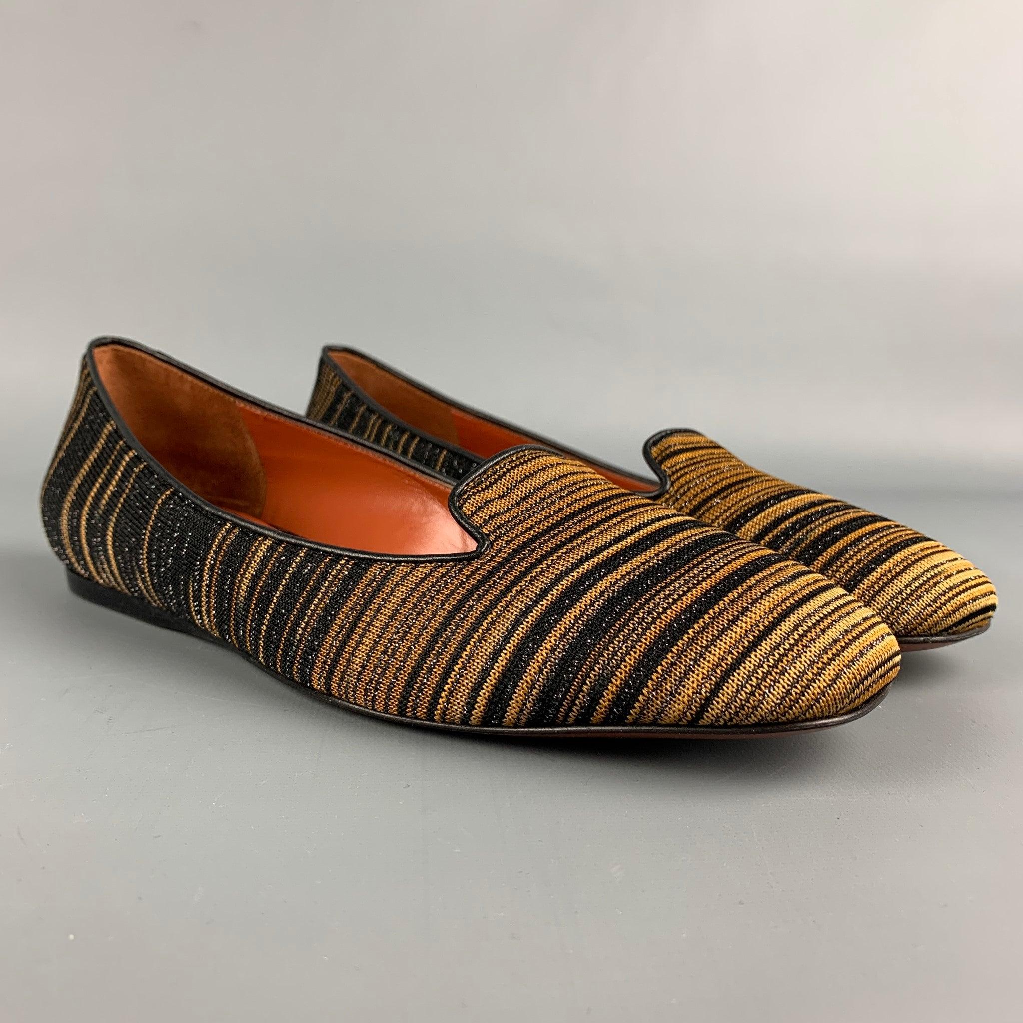 MISSONI flats comes in a black & gold stripe fabric featuring a slip on style. Comes with box. Made in Italy.
Excellent Pre-Owned Condition. 

Marked:   38Outsole: 3 inches  x 9.5 inches  
  
  
 
Reference: 111437
Category: Flats
More Details
   
