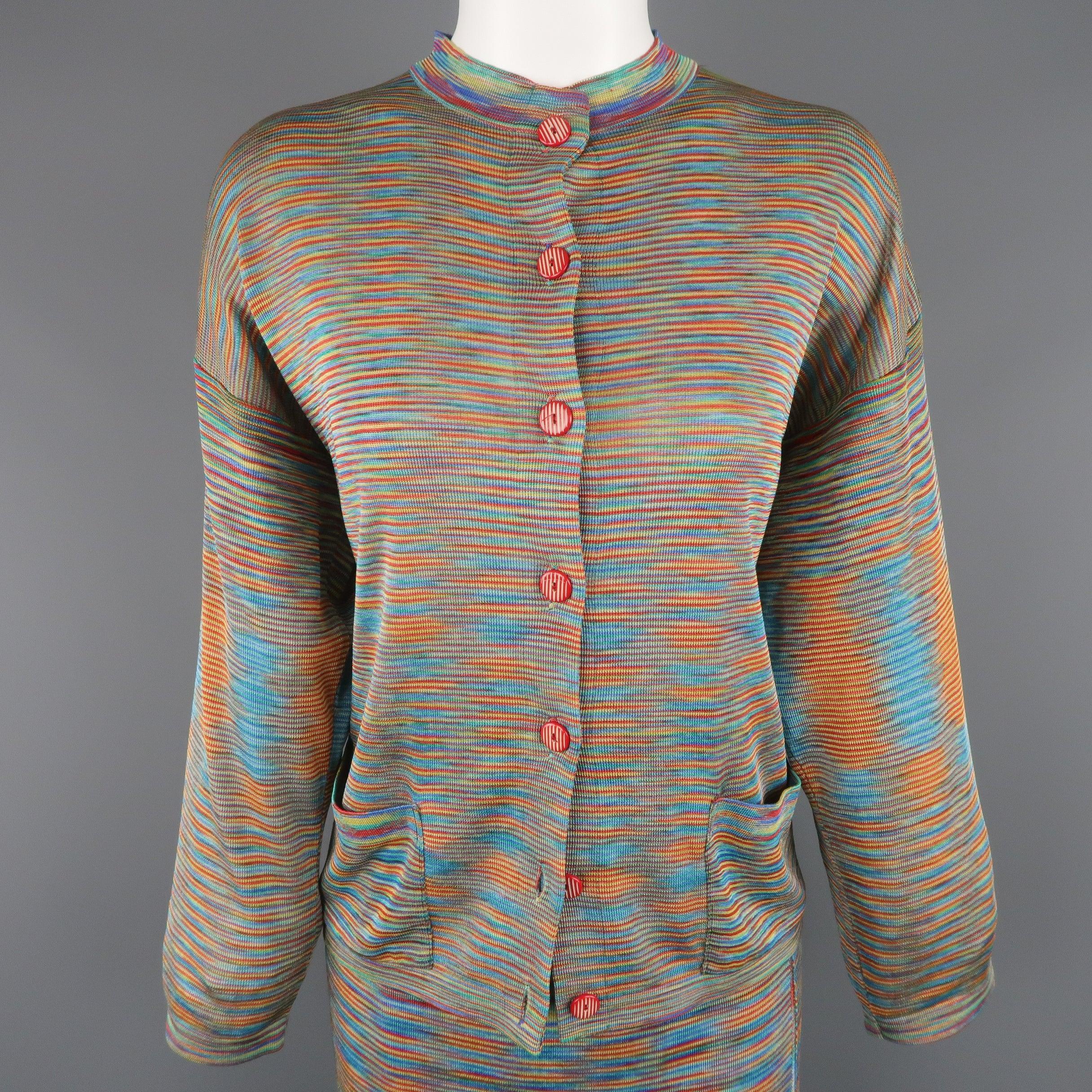 Vintage MISSONI ensemble comes in multi-color moire stripe rayon knit and includes a crewneck cardigan with red buttons and matching A line skirt with slit. Made in Italy.
Excellent Pre-Owned Condition.
 

Marked:   IT 44
 

Measurements: 
 