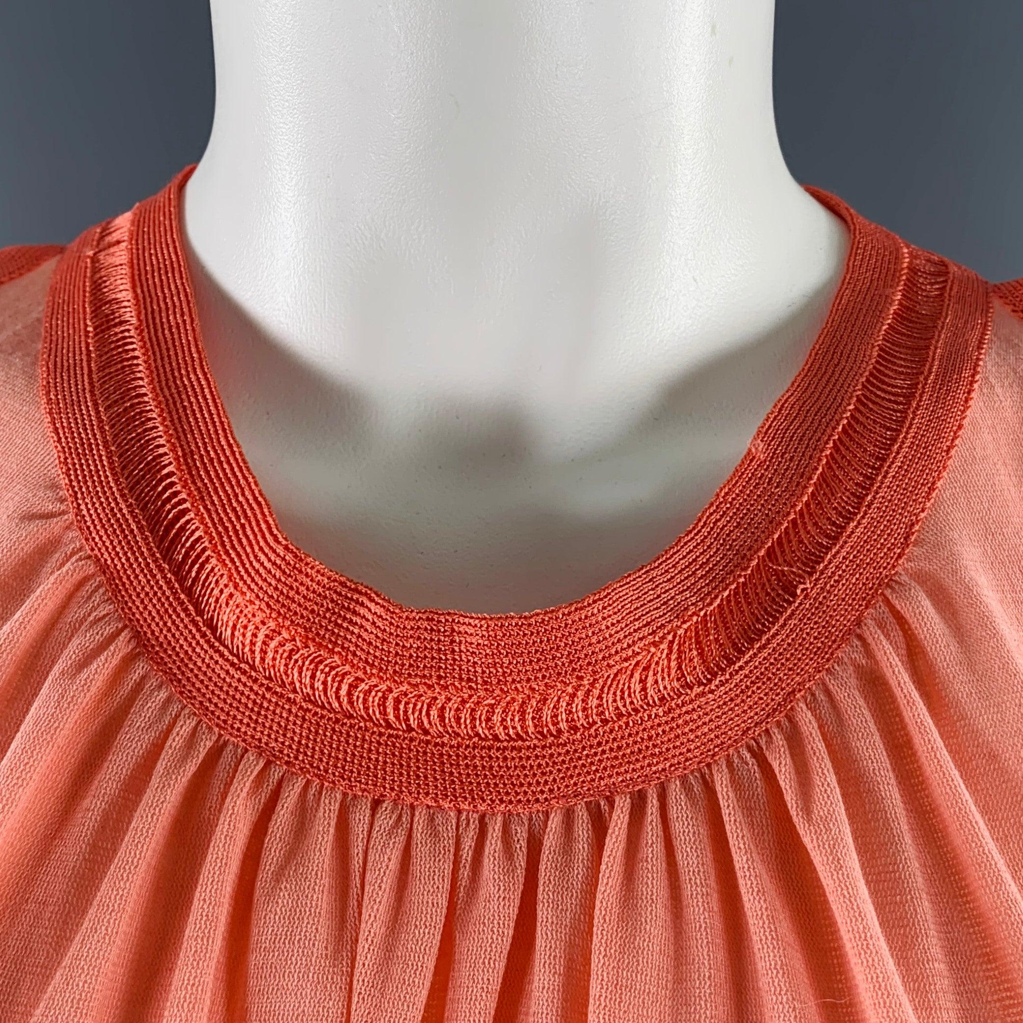 MISSONI casual top
in a coral and orange cotton knit featuring a sleeveless style, and contrasting trim. Made in Italy.Very Good Pre-Owned Condition. Minor signs of wear on collar. 

Marked:   size not marked 

Measurements: 
 
Shoulder: 9.5 inches