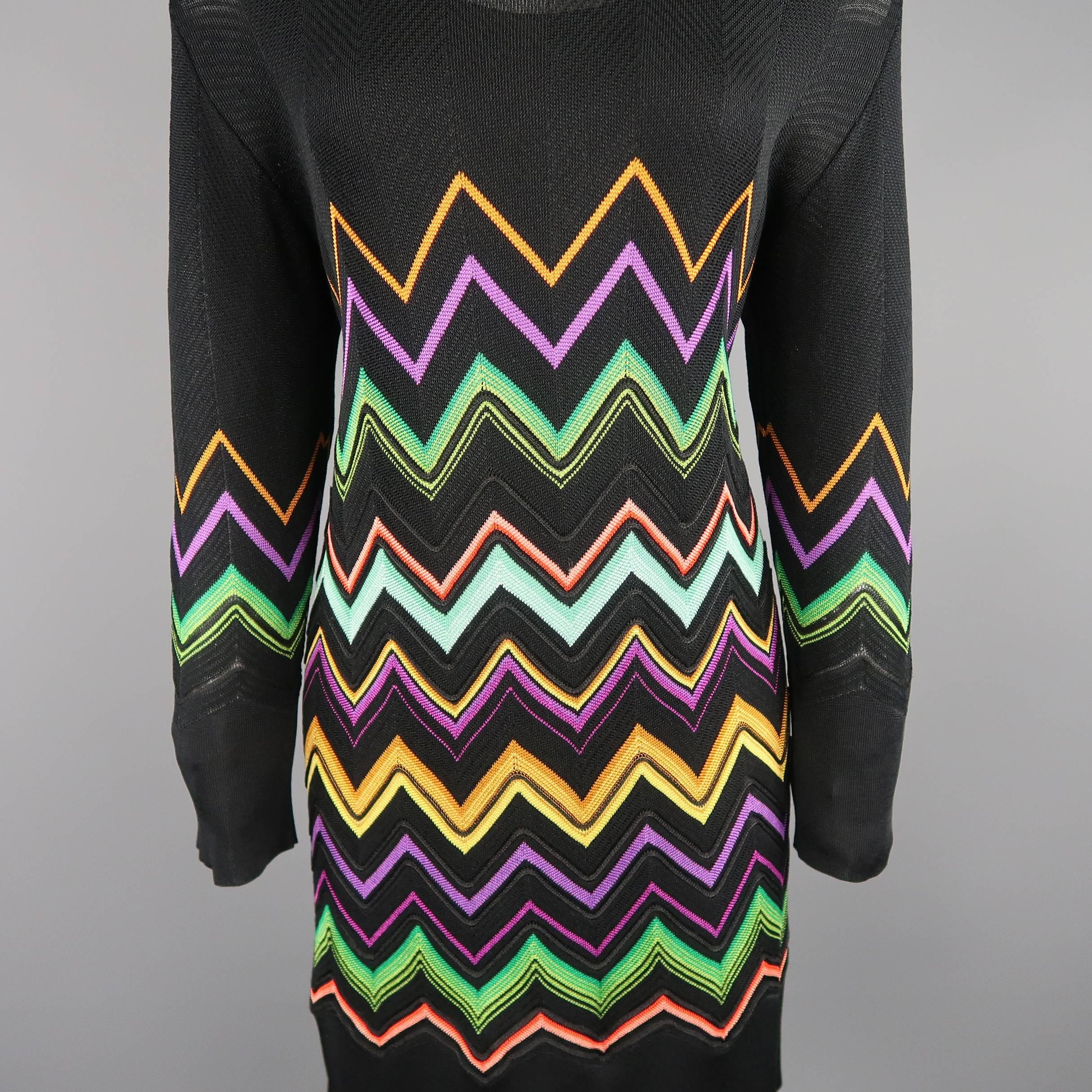 MISSONI shift dress comes in a light weight black textured silk knit with multi-color chevron stripe pattern, round neck, and long sleeves. With chiffon slip. Made in Italy.
 
Good Pre-Owned Condition.
Marked: IT 46
 
Measurements:
 
Shoulder: 18
