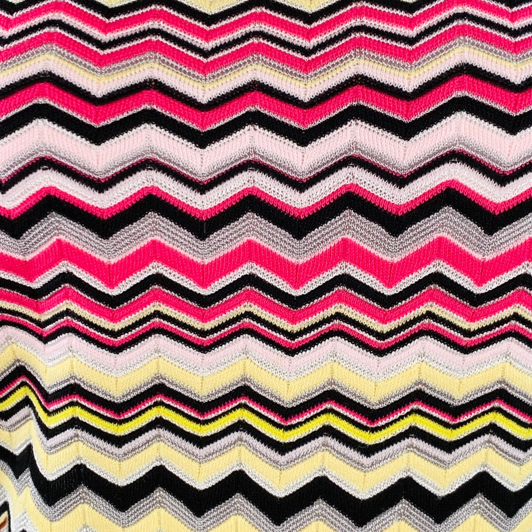 MISSONI pullover in a black and multicolor cotton blend knit featuring an all over zig zag pattern, long sleeves, and crew neck. Made in Romania.Excellent Pre-Owned Condition. 

Marked:   IT 38 

Measurements: 
 
Shoulder: 16.5 inches Bust: 35