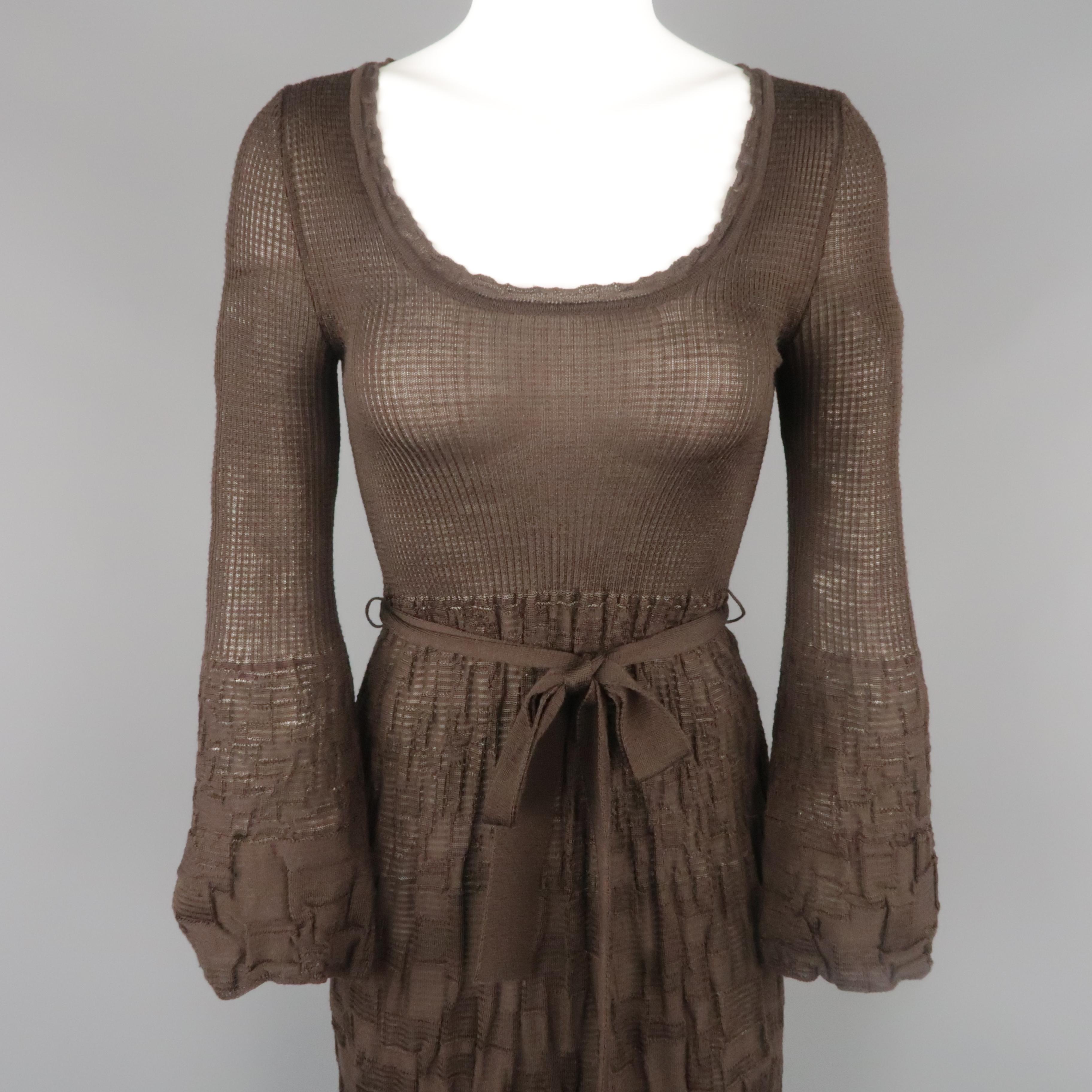 M by MISSONI dress comes in brown wool viscose blend textured stretch knit with a scoop neck, long bell sleeves, and ft flair A line skirt silhouette with tie belt. Made in Italy.
 
Excellent Pre-Owned Condition.
Marked: IT 38
 
Measurements:
