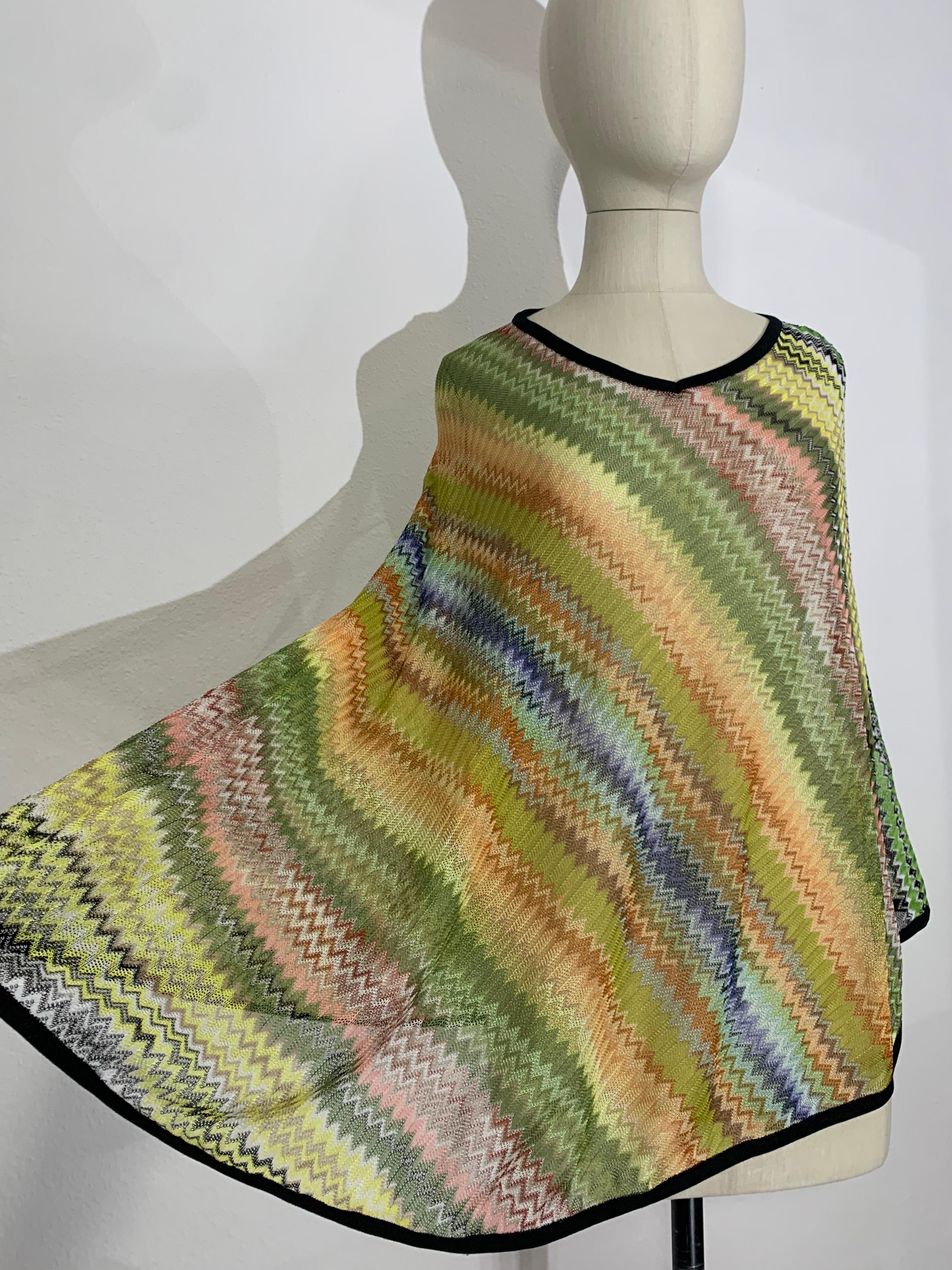 Missoni Spring/Summer Rayon & Cotton Knit Cover-Up in Classic Missoni Zig-Zag:  This classic Missoni lightweight swimsuit cover-up is asymmetrical in shape and the palette is in chartreuse, mint, pink and yellows with black banding trim. Size Small. 