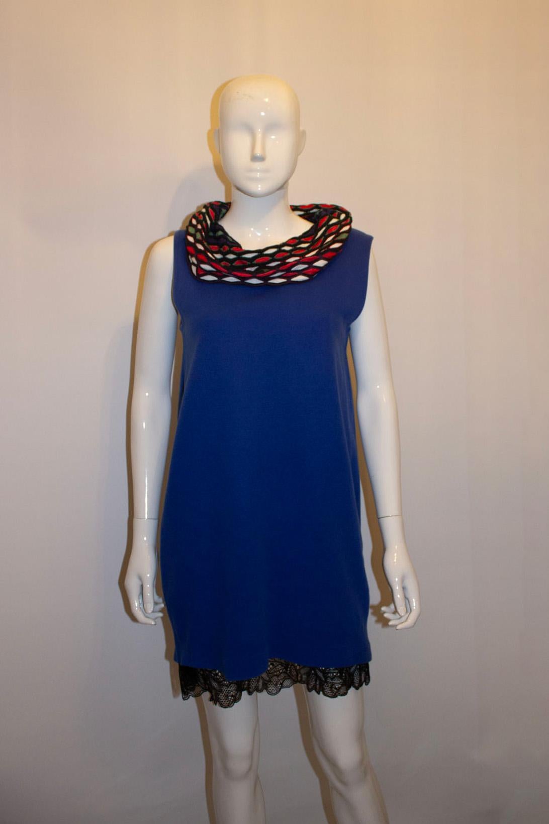 A fun and bright top from Missoni M line. The body is in a bright blue colour with a wide multicolour collar, blue ,grey, red and white. 100% cotton.
Size L Measurements: Bust up to 40'', length  32''