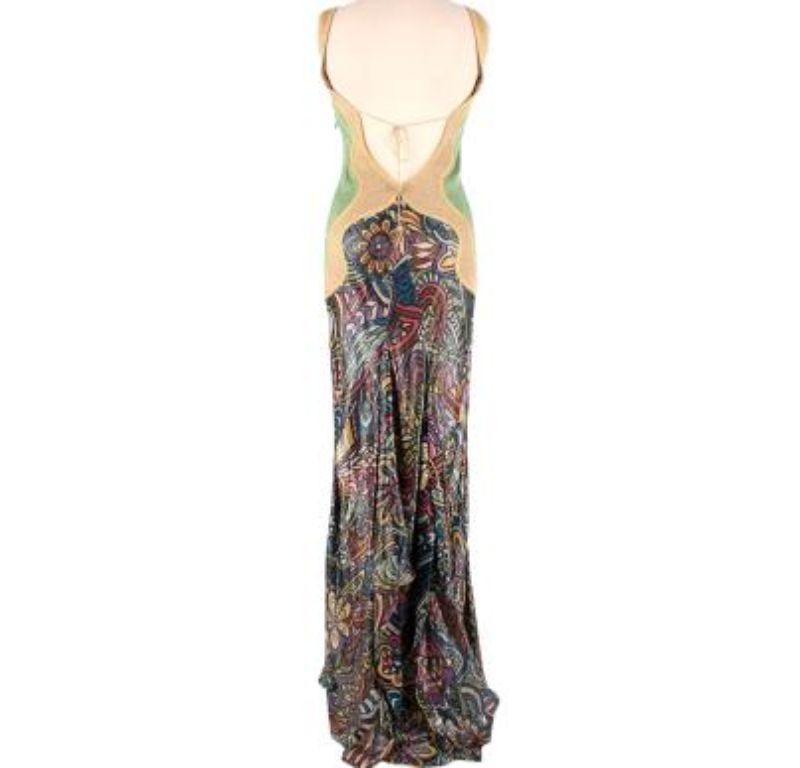 Missoni Vintage Floral Lurex Gown

-Multi colour pattern long dress, with gold metallic boarders 
-Thin tie up at the back 
- Light weight 
- Concealed zip on the side

Material
-86% silk
-14% polyester 

Washing
-Dry clean

MADE IN ITALY

Fantastic