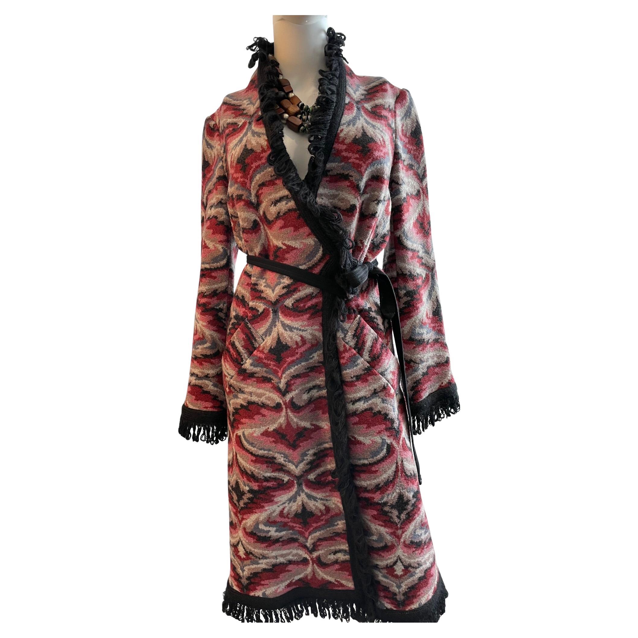 MISSONI Vintage Knitted Long Wool Coat - Multi Coloured - Black Fringe & Belt 

A stunning vintage Missoni Multi-Coloured : Dark Red, Pink, Black Pattern Knitted Long Coat.  100% Original and authentic. Black knit fringe trim and side pockets. Can