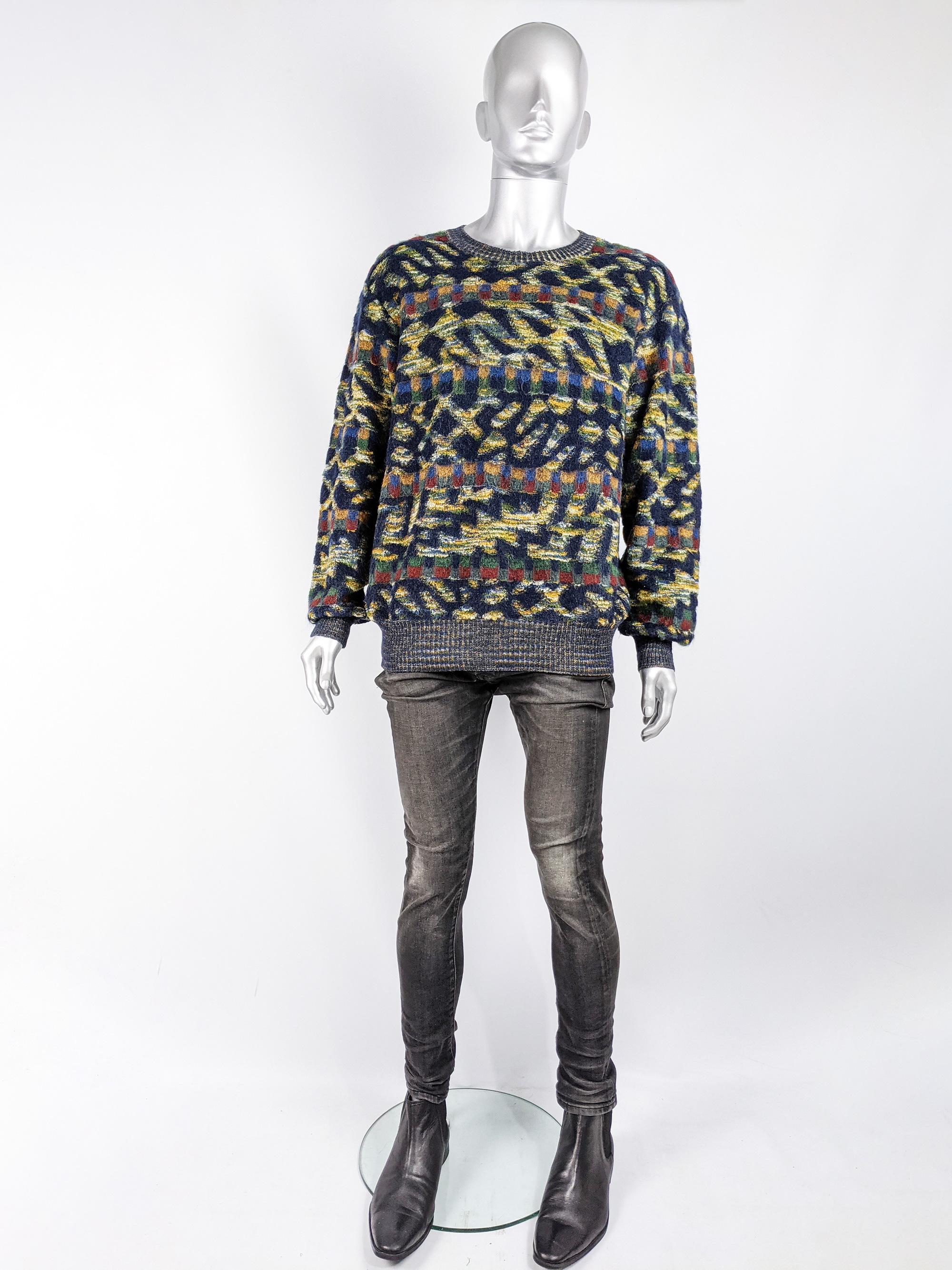 A vibrant and rare vintage men's Missoni pullover jumper/ sweater from the 80s in a bold and fuzzy multicolored mohair and wool knit fabric. 

Size: Marked IT 52 which equates to a mens XL but this gives a loose fit
Chest - 48” / 122cm (meant to