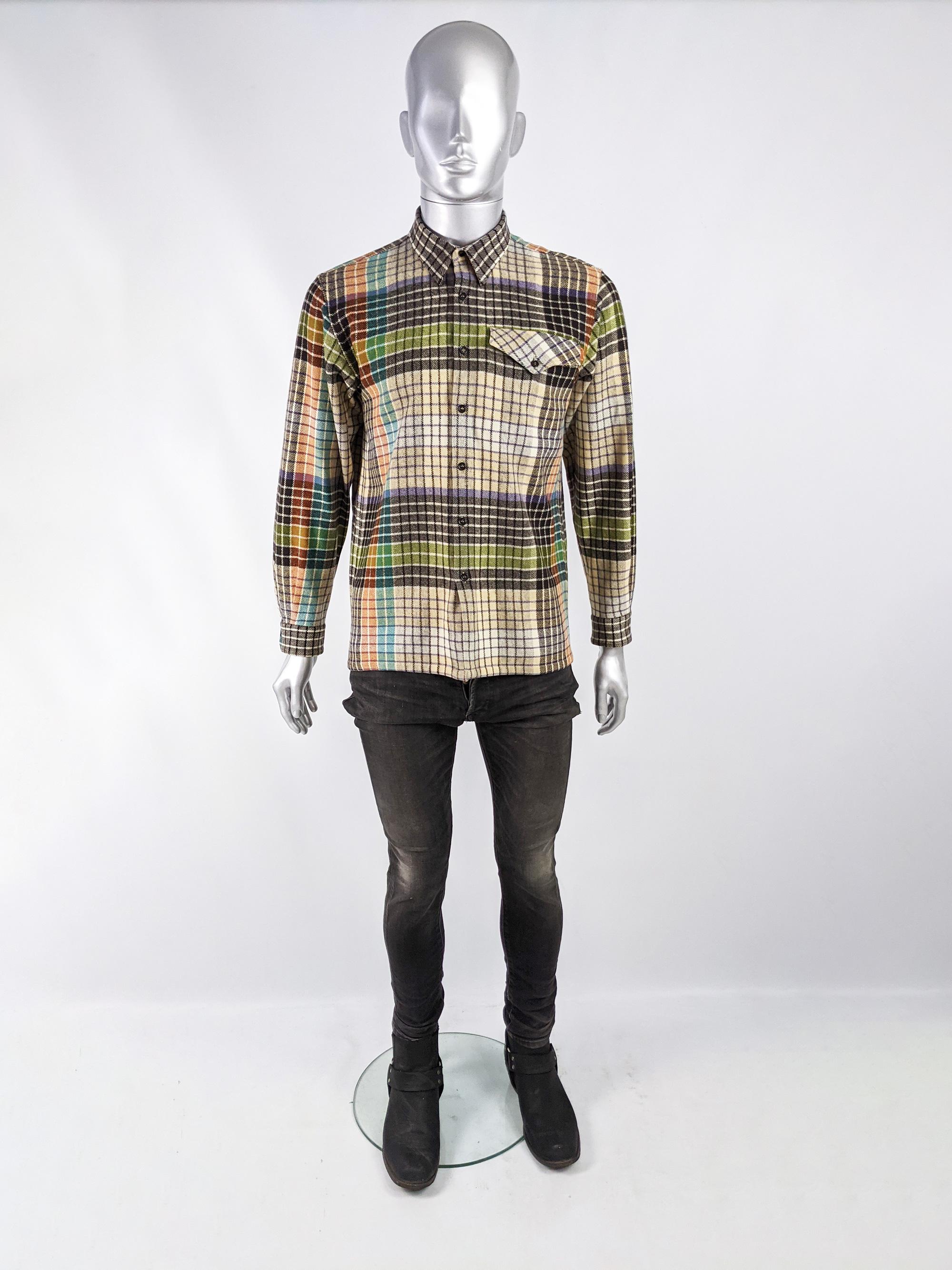 An amazing and rare vintage mens Missoni shirt from the 80s in a wool flannel with a multicoloured check throughout with long sleeves and green knit elbow patches. 

Size: Marked M. Please check measurements. 
Chest - 42” / 106cm
Waist - 40” /