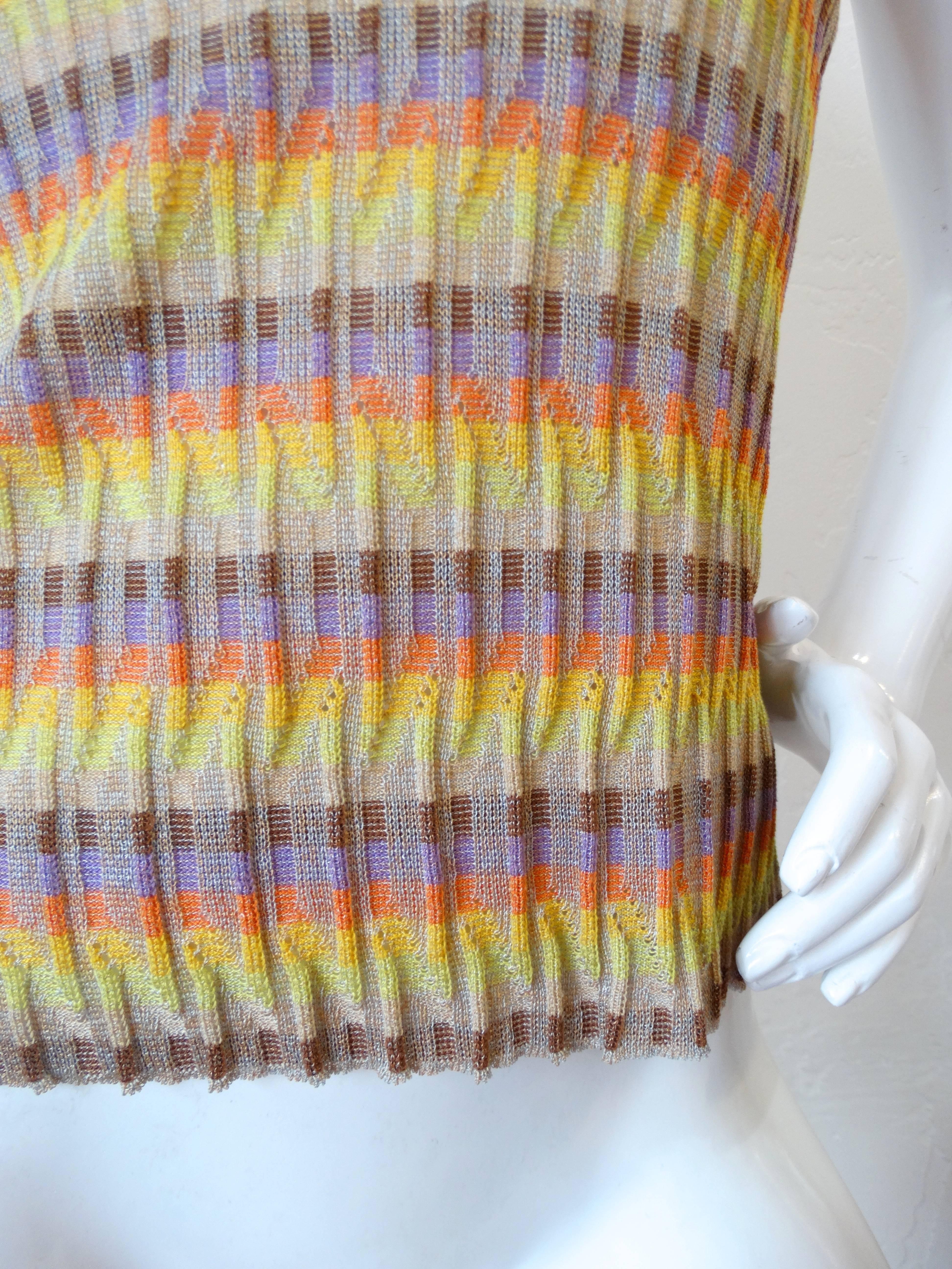The perfect piece for your summer wardrobe- this adorable little Missoni knit tank! Pair with your favorite ripped denim and a belt bag and you're festival ready! Made of a slightly sheer knit fabric in multicolor wavy stripes. Tank top style fit