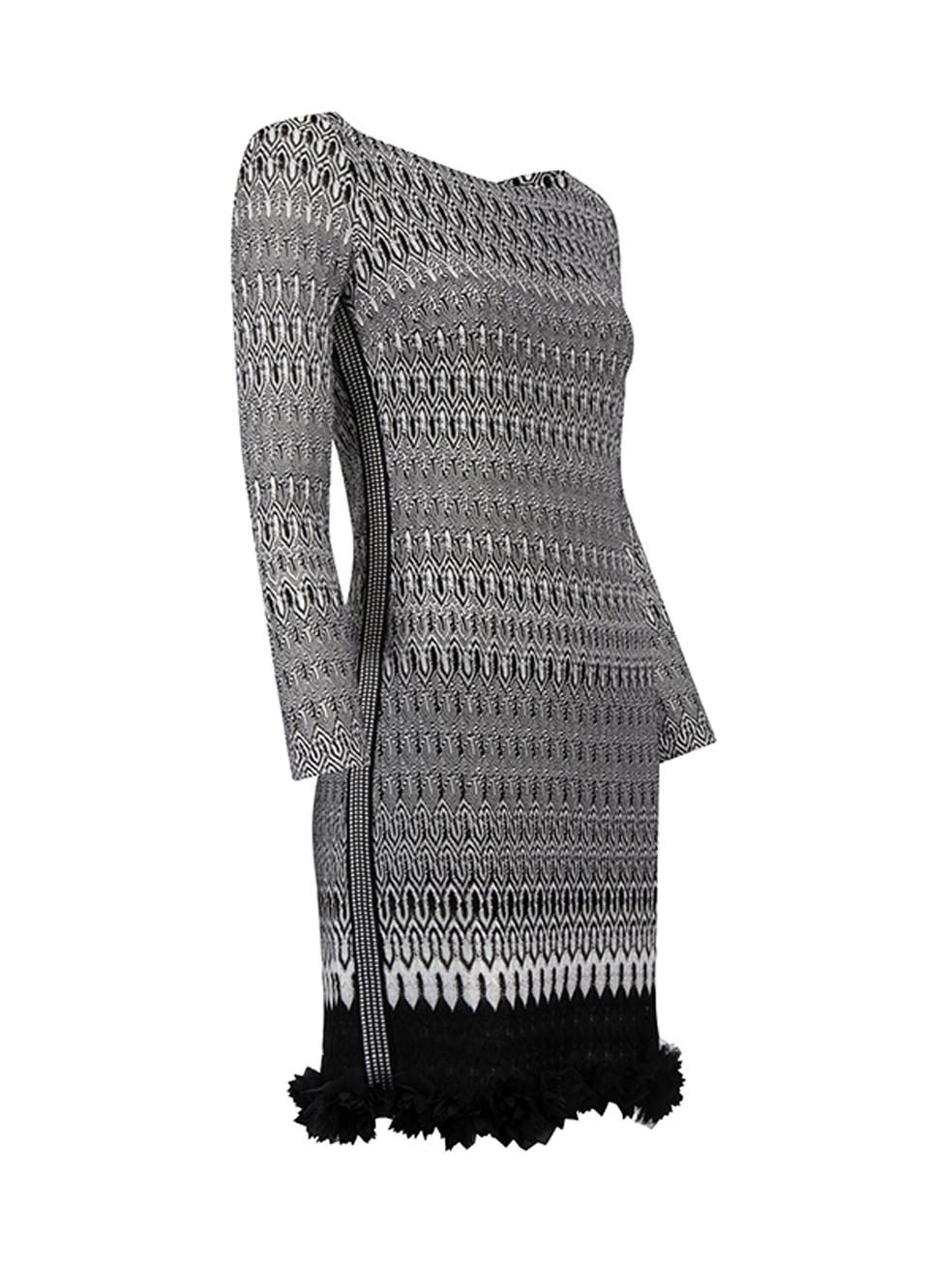 CONDITION is Never Worn. No visible wear to dress is evident on this used Missoni designer resale item. Details Black and white Synthetic Mini dress Ethnic pattern Long sleeves Boat neckline Flowers embellishment on hemline Made in Italy Composition