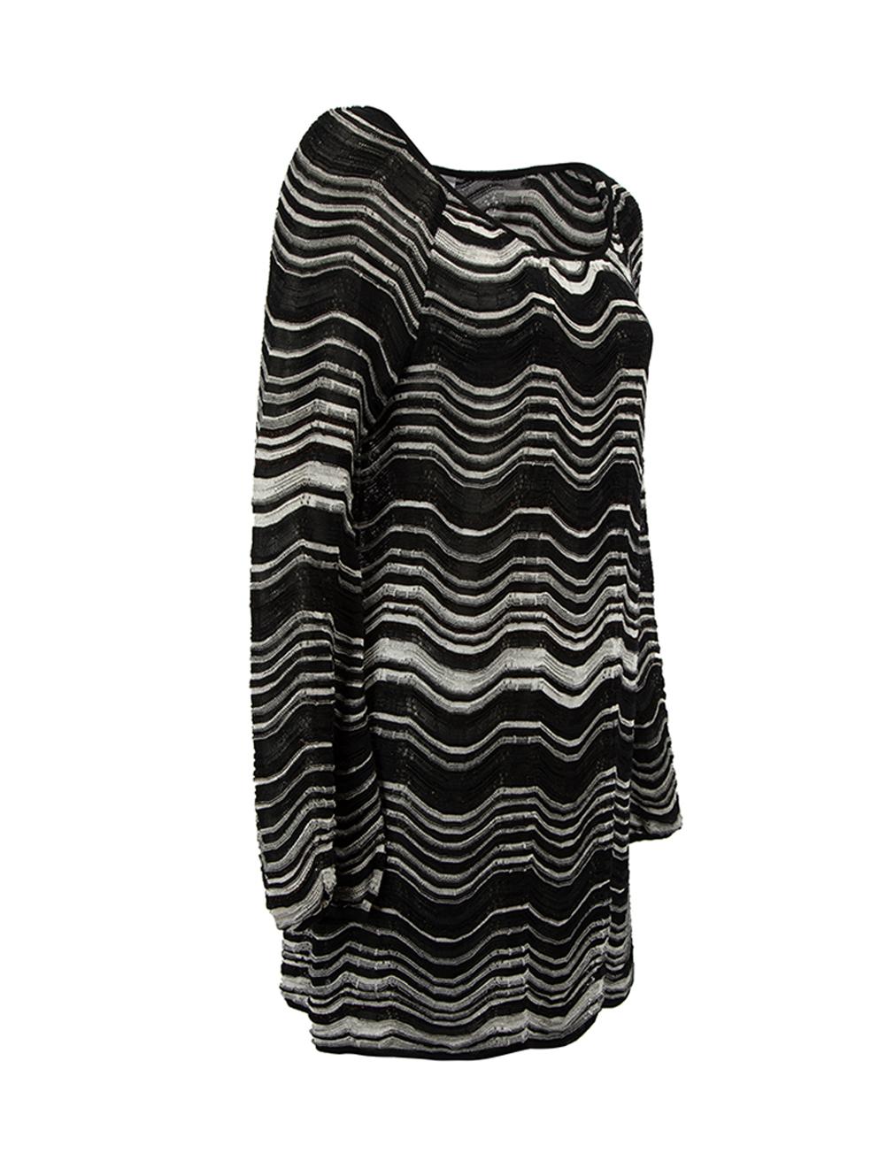 CONDITION is Very good. Hardly any visible wear to top is evident on this used M Missoni designer resale item.

Details
Black
Cotton
Long sleeves tunic top
Wavy stripe pattern
Round neckline
Made in Tunisia
Composition
51% Cotton, 36% Viscose, 6%