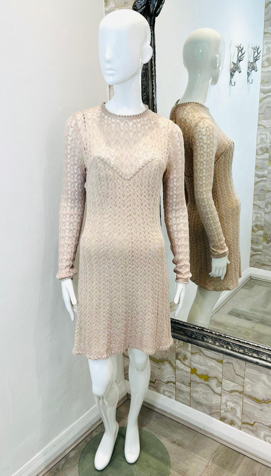 Missoni Wool Blend Crochet Knitted Dress

Beige mini dress designed with the brand's signature wave pattern.

Detailed with pearl button fastening to rear.

Featuring sheer accents to the upper, crew neckline and silk lining.

Size – 44IT

Condition