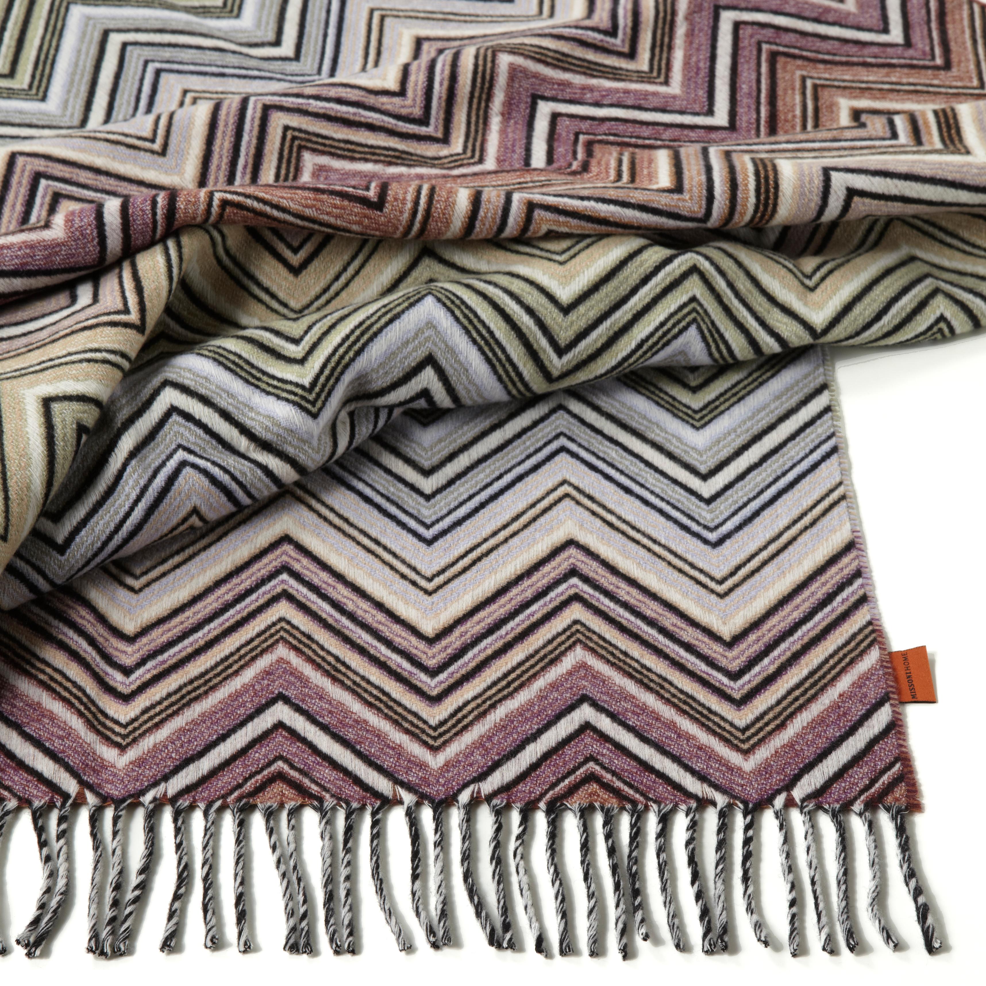 Wool and Cashmere throw in multicolor chevron. Presented in a branded gift box. Perfect for adding an elegant touch to any bedroom or living room.

Composition: 90% Wool, 10% Cashmere. Care: delicate dry-clean with perchlorethylene.

