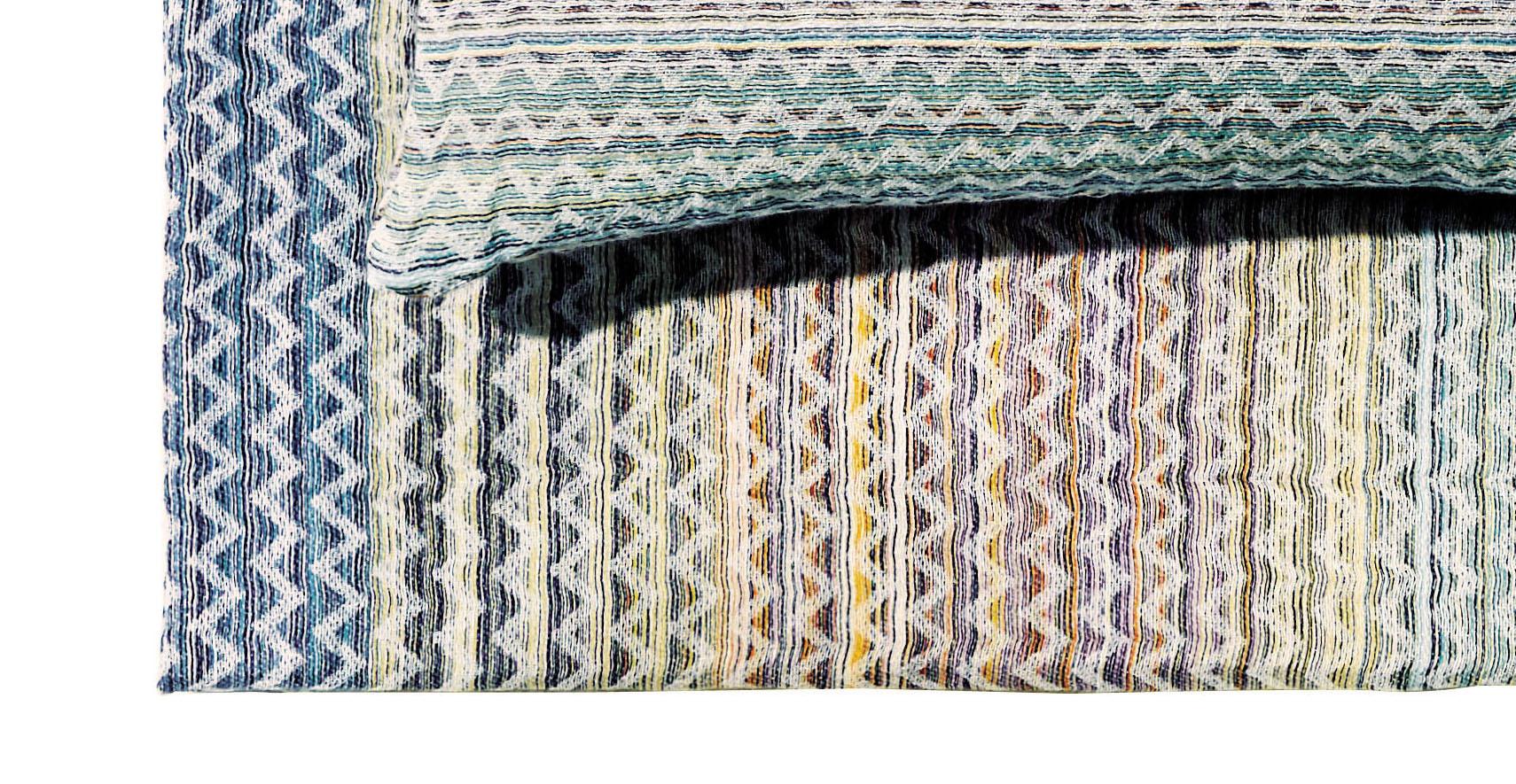 Light weight throw in a multi-color, chevron design. Perfect for adding an elegant touch to any bedroom or living room.

Composition: 55% linen, 40% cotton, 5% polyester. Care: delicate dry-clean with perchlorethylene. Throw dimensions: W 39 in x H