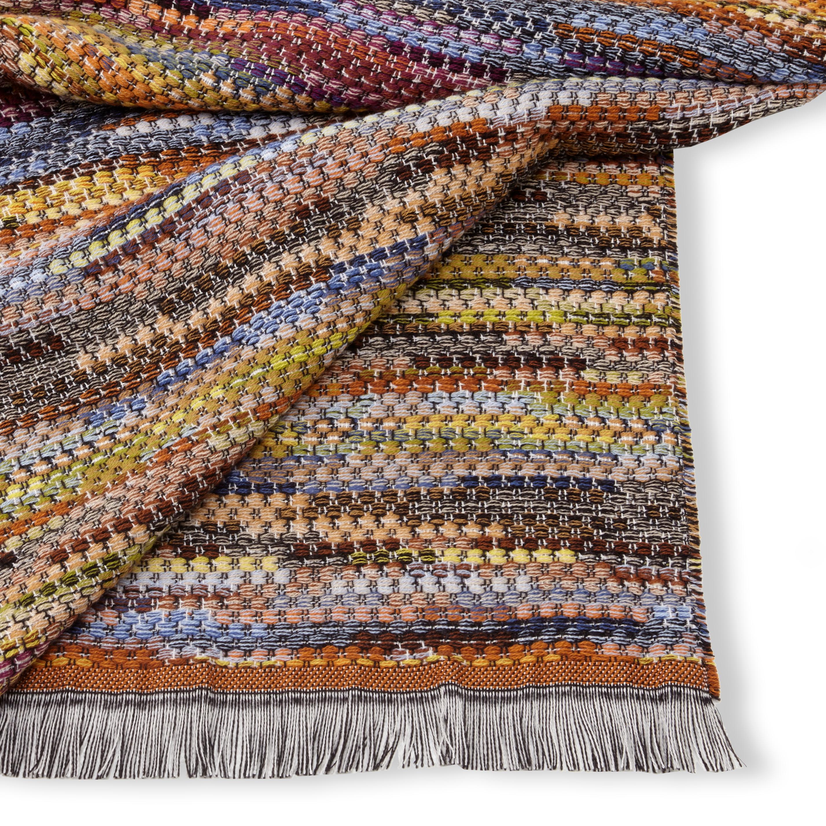 MissoniHome multicolored woven throw in iconic color palette. All Missoni Home products are custom made to order with the highest quality materials. Perfect for adding an elegant touch to any bedroom or living room.

Composition: 50% wool, 50%